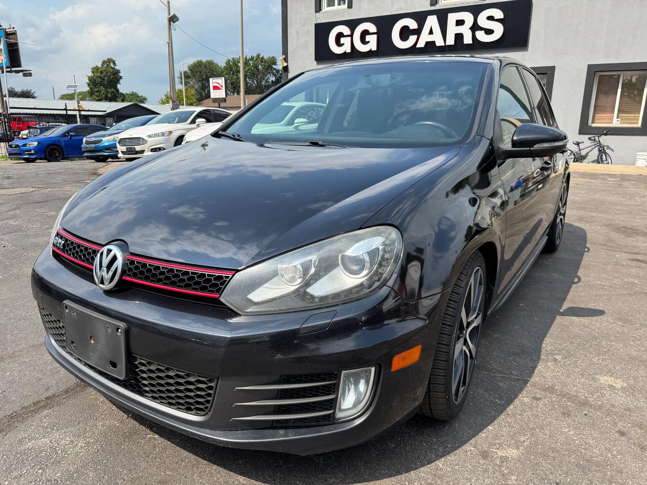 <p>✅ Certified | <strong>2012 Volkswagen GTI | No Accidents</strong></p><p>This Certified 2012 Volkswagen GTI is a sporty hatchback that combines turbocharged performance, German engineering, and everyday practicality. With a <strong>clean accident-free history</strong> and <strong>212,769 KM</strong>, its an excellent choice for enthusiasts and daily drivers alike.</p><p>🔹 <strong>2.0L Turbocharged TSI 4-Cylinder Engine</strong><br>🔹 Automatic Transmission<br>🔹 Front-Wheel Drive (FWD)<br>🔹 <strong>No Accidents</strong><br>🔹 <strong>212,769 KM</strong><br>🔹 Sport Cloth Interior with Plaid Seats<br>🔹 Heated Front Seats<br>🔹 Power Sunroof<br>🔹 Touchscreen Audio System<br>🔹 Bluetooth &ndash; Hands-Free Calling & Audio Streaming<br>🔹 Steering Wheel Audio & Cruise Controls<br>🔹 Air Conditioning<br>🔹 Keyless Entry<br>🔹 Power Windows, Locks & Mirrors<br>🔹 GTI Alloy Wheels<br>🔹 Split Folding Rear Seats<br>🔹 Traction Control & ABS<br>🔹 Spacious Hatchback Cargo Area<br>🔹 Runs and Drives Excellent</p><p>📍 Visit Us:<br>74 Parkdale Avenue North, Hamilton, Ontario</p><p>📞 Call or Text:<br>(905) 975-9705 / (905) 462-5542</p><p>📧 Email:<br><a href=mailto:gusmarkos@gmail.com>gusmarkos@gmail.com</a></p><p>🗓️ Test Drives by Appointment Only &mdash; Book Yours Today</p><p>🛡️ Buy With Confidence &mdash; OMVIC Licensed Dealership<br>✔️ CARFAX VERIFIED &mdash; Full History & Lien-Free<br>✔️ No Hidden Fees &mdash; Just Price + HST + Licensing<br>✔️ Trade-Ins Welcome &mdash; Top Dollar for Your Vehicle<br>✔️ Don&rsquo;t See What You Want? We&rsquo;ll Find It for You</p><p>💻 100% Online Purchase Available &mdash; Financing & Delivery Options<br>🚗 Ontario-Wide Delivery Available<br>✈️ Ask About Our Customer Travel Program</p>