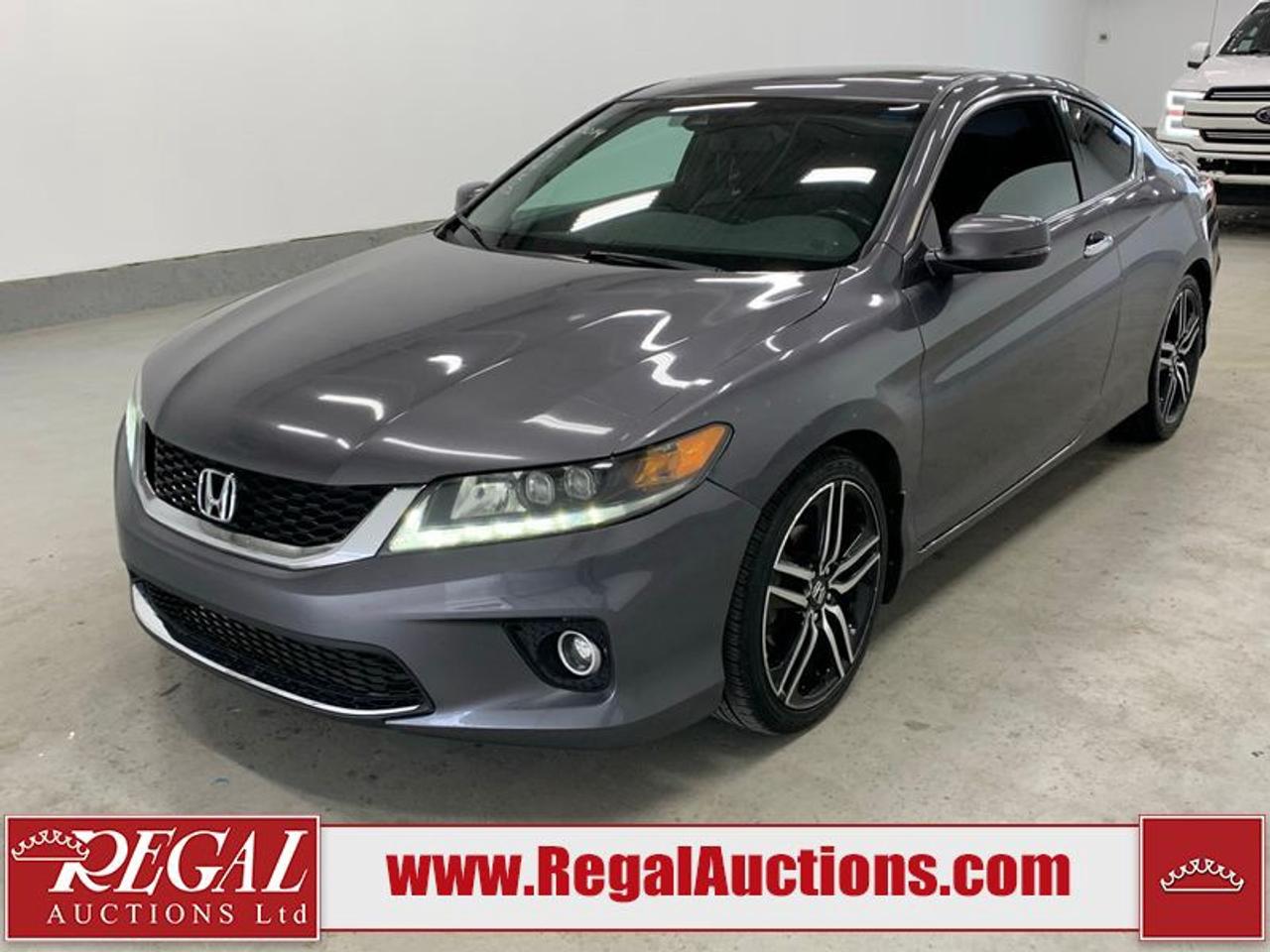 OFFERS WILL NOT BE ACCEPTED BY EMAIL OR PHONE - THIS VEHICLE WILL GO ON TIMED ONLINE AUCTION.<br><br/>VEHICLE DESCRIPTION <br/>Stock #: 49452 <br/>Lot #: 814 <br/>Reserve Price: $10,000 <br/>CarProof Report: Available at www.RegalAuctions.com <br/><br/>IMPORTANT DECLARATION <br/>Claim History: Claim History. <br/>Hail Damage: Hail Damage. <br/>Rebuilt Status: This vehicle has been rebuilt from salvage. <br/> Live Online Bidding: This vehicle will be available for bidding over the internet, visit www.RegalAuctions.com to register. <br/> <br/>The simple solution to selling your car or truck. Bring your clean vehicle in with your Drivers License and current Registration and well put it on the auction block at our next sale.<br/><br/>www.RegalAuctions.com