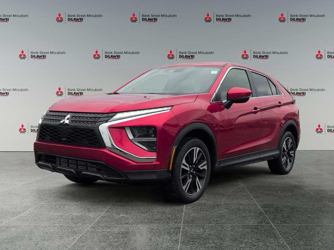 Balance of 5 year/100,000kms BASIC warranty and 10 year/160,000kms Factory Powertrain Warranty on ALL MITSUBISHI products! Best in the industry!!!! Introducing the 2024 Mitsubishi Eclipse Cross ES S-AWC, a striking red SUV with a capable 4x4 drivetrain and effortless handling thanks to its automatic transmission. This vehicle blends bold design and practicality, making it an ideal choice for both city driving and weekend adventures. The exteriors vibrant red color complements its modern alloy wheels, creating a stunning visual impact. Inside, the Eclipse Cross offers a comfortable and functional cabin with heated front seats and heated mirrors, ensuring comfort in colder climates. Stay connected and entertained with advanced technology features, including a user-friendly backup camera, satellite radio, smart device integration, and Bluetooth connectivity. The vehicle also prioritizes safety and convenience with keyless entry, brake assist, and a reliable cruise control system, leaving you feeling secure and confident on the road. This SUV is perfect for those who value style, technology, and all-weather capability. Whether youre a busy professional or an adventure seeker, contact Bank Street Mitsubishi today for more information and to schedule a test drive. We are here to assist you in finding your perfect ride!