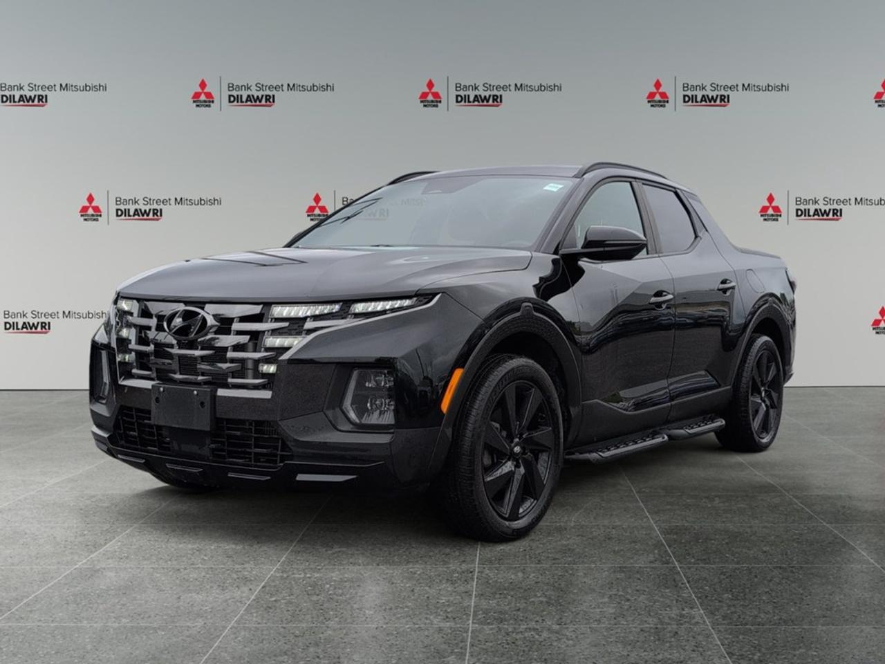 Balance of 5 year/100,000kms BASIC warranty and 10 year/160,000kms Factory Powertrain Warranty on ALL MITSUBISHI products! Best in the industry!!!! Introducing the 2023 Hyundai Santa Cruz Ultimate in an elegant gray color with an all-wheel-drive system that ensures superb handling on any terrain. This all-purpose truck combines versatility with ultimate style for those looking to make a statement on the road. The exterior of the Santa Cruz boasts attractive alloy wheels and practical running boards, while the available sunroof/moonroof adds a touch of luxury. The sleek design complements the robust capabilities of the truck, making it perfect for both city commutes and outdoor adventures. Inside, youll find a perfectly appointed interior, featuring leather seats that not only offer comfort but a refined touch of elegance. The leather steering wheel and gear shifter add additional elements of sophistication. Equipped with modern conveniences such as keyless entry, power seats, and power windows, youll find yourself surrounded by comfort and ease. Advanced technology is at your fingertips with a state-of-the-art navigation system, satellite radio, and smart device integration, keeping you connected wherever your journey takes you. Safety is key with features like a backup camera, lane assist, and brake assist, alongside adaptive cruise control to enhance every drive. This vehicle is ideal for adventurous spirits and tech enthusiasts alike, offering unmatched comfort and modern features. Experience the Hyundai Santa Cruz Ultimate AWD for yourselfcontact Bank Street Mitsubishi today to learn more about how this truck can be yours.