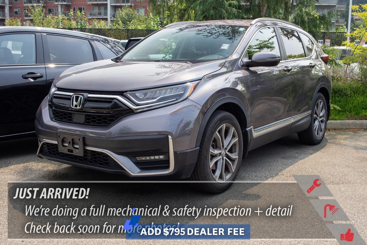 2022 Honda CR-V Touring AWD Premium Comfort and Confidence  Certified UsedThe 2022 Honda CR-V Touring AWD brings together upscale comfort, versatile SUV space, and confident all-weather capability. Well equipped for commuting through Port Moody and Coquitlam or heading beyond Metro Vancouver, the Touring delivers many of the CR-V lineups most desirable features.**Key highlights include:*** Real Time AWD with Intelligent Control System* Leather-trimmed seating* Heated front and rear seats* Heated leather-wrapped steering wheel* Drivers seat position memory* Power-adjustable front seats* Power moonroof* Hands-free power tailgate* Honda satellite-linked navigation* Apple CarPlay and Android Auto* Wireless smartphone charging* Premium audio system* Remote engine start* Dual-zone automatic climate control* Proximity key entry with push-button start* LED headlights and fog lights* Honda Sensing driver-assist technologies* Adaptive Cruise Control* Lane Keeping Assist System* Collision Mitigation Braking System* Blind Spot Information systemReal Time AWD adds confidence when Metro Vancouver rain turns heavy or BC winter conditions change, while the CR-Vs comfortable seating and flexible cargo area work equally well for everyday errands and Sea-to-Sky getaways.As a 2022 Honda, this CR-V qualifies as **Certified Used**, including Honda Certified inspection standards and a **7-year / 160,000km transferable powertrain warranty**.Westwood Hondas **BuySmart Program** provides additional peace of mind with a **Full CarProof vehicle history report**, **Mechanical inspection**, **2-month / 5,000km powertrain warranty**, **6-month tire, brake, battery, and bulb coverage**, **Professional detailing**, **Full tank of gas or full EV charge**, and **Market-based no-haggle pricing**.**Book your test drive at Westwood Honda today.****Apply for financing online today.****Bring us your trade-in for an appraisal.**## FAQs**Q: Is the 2022 CR-V Touring AWD?**A: Yes, Canadian Touring models feature Real Time AWD.**Q: Is this CR-V Certified Used?**A: Yes, this 2022 Honda qualifies.**Q: Does Touring have leather seating?**A: Yes, Touring includes leather-trimmed seating.**Q: Is it suitable for Vancouver commuting?**A: Yes. Its comfortable size works well for city and highway driving.**Q: Is it equipped for BC winters?**A: AWD and heated features add useful cold-weather capability.**Q: Does Westwood Honda accept trade-ins?**A: Yes. Trade-ins and financing are available in Port Moody.