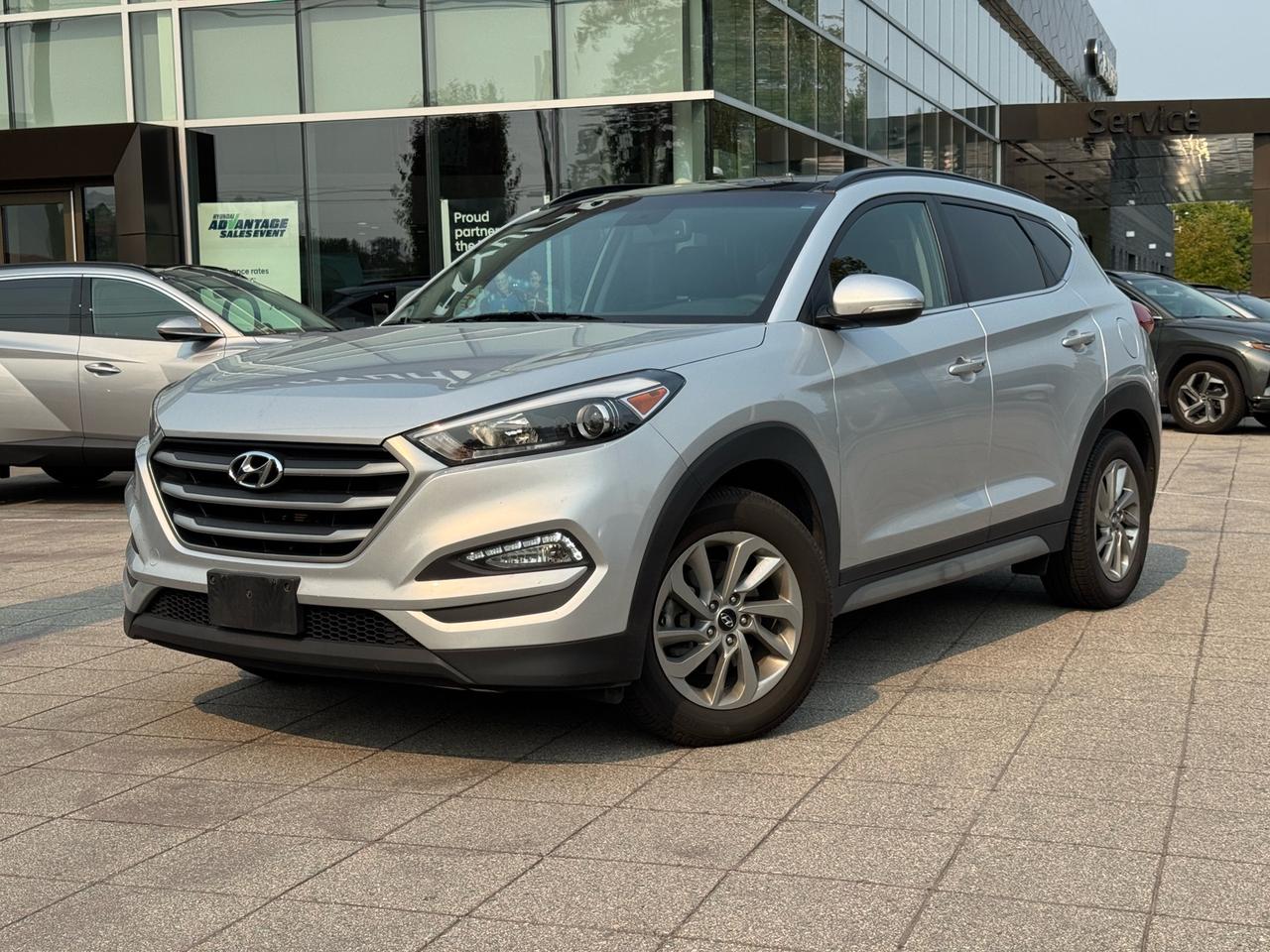 Service Records | One Owner | Low Kilometres | AWD | Luxury Trim | Leather Interior | Panoramic Sunroof | Heated Seats<br><br>2018 Hyundai Tucson Luxury AWD<br><br>This 2018 Hyundai Tucson Luxury AWD is now available at White Rock Hyundai, offering excellent value, everyday comfort, and confident all-wheel drive capability in a practical compact SUV. Finished in Molten Silver and powered by a 2.0L 4-cylinder engine paired with a 6-speed automatic transmission with overdrive, this Tucson delivers smooth and reliable driving for White Rock, South Surrey, Surrey, Delta, Langley, and Vancouver.<br><br>With only 99,096 kilometres, one owner, and service records, this Hyundai Tucson Luxury stands out as a smart choice for drivers looking for a well-equipped SUV with strong value and a proven history. The Luxury trim adds a premium feel with features such as leather interior, panoramic sunroof, heated seats, backup camera, Bluetooth, blind-spot detection, and modern safety technology. If youre searching for a used Hyundai Tucson for sale in White Rock, this low kilometre AWD compact SUV is a strong option for daily driving and year-round confidence.<br><br>Why Buy From White Rock Hyundai?<br>* 7x Hyundai Presidents Award of Merit Winner<br>* 3x Consumer Choice Award for Business Excellence<br>* AutoTrader Dealer of the Year<br><br>M-Promise Certified Pre-Owned ($995 value) includes:<br>* 30-day / 2,000 km Exchange Program<br>* 3-day / 300 km Money Back Guarantee<br>* Comprehensive 144-Point Mechanical Inspection<br>* Full Synthetic Oil Change<br>* BC Verified CARFAX<br>* Minimum 6 Month Powertrain Warranty<br><br>Buy with confidence at White Rock Hyundai. Our vehicles are priced competitively based on market demand, condition, and kilometres to give our customers a transparent and hassle-free buying experience.<br><br>Visit White Rock Hyundai today to test drive this 2018 Hyundai Tucson Luxury AWD. We proudly serve drivers in White Rock, South Surrey, Surrey, Delta, Langley, and Vancouver with quality pre-owned vehicles and a professional, no-pressure experience.<br><br>Contact our team today to confirm availability, explore financing options, and reserve this vehicle.<br><br>* All vehicle purchases are subject to a $799 administration fee. Dealer #31129.