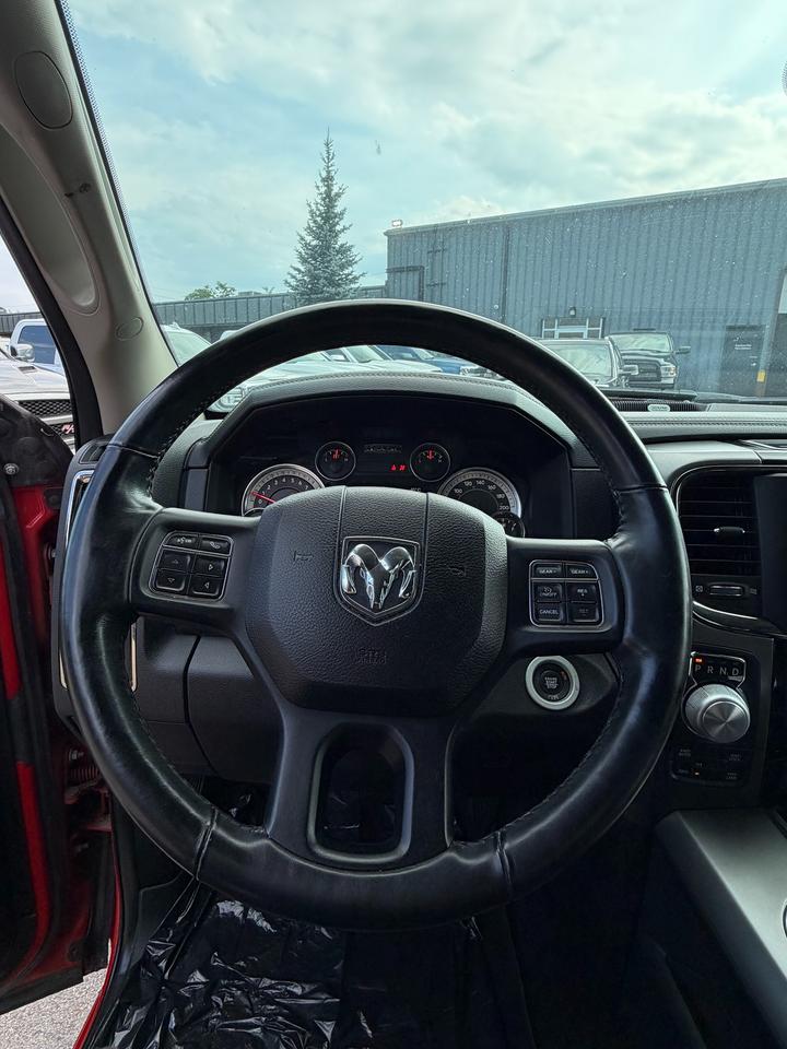 2017 RAM 1500 4WD CREW CAB 140.5" SPORT NIGHT - Stk# 323A Photo
