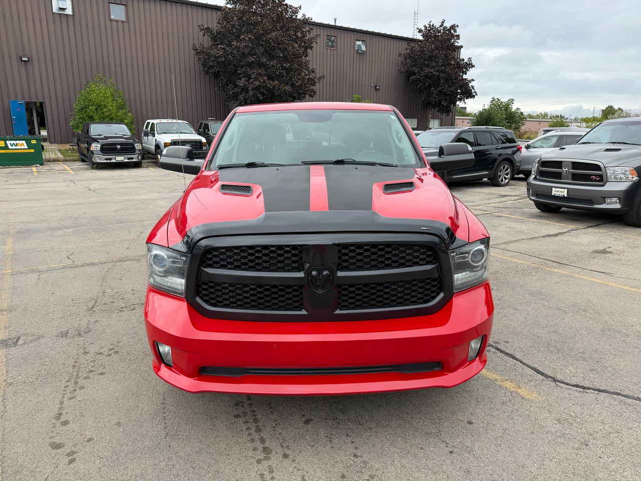 2017 RAM 1500 4WD CREW CAB 140.5" SPORT NIGHT - Stk# 323A Photo2