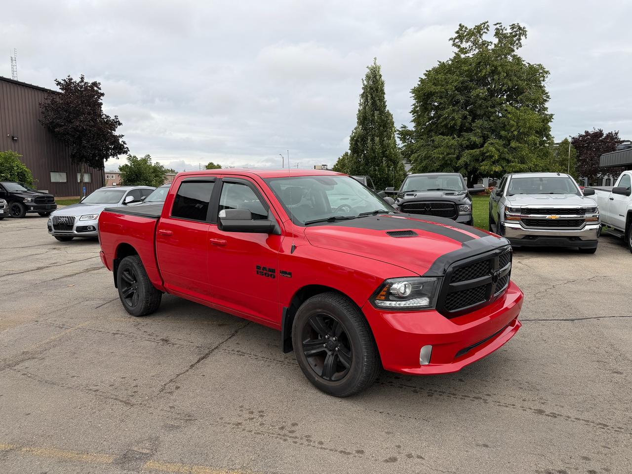 2017 RAM 1500 4WD CREW CAB 140.5" SPORT NIGHT - Stk# 323A Photo