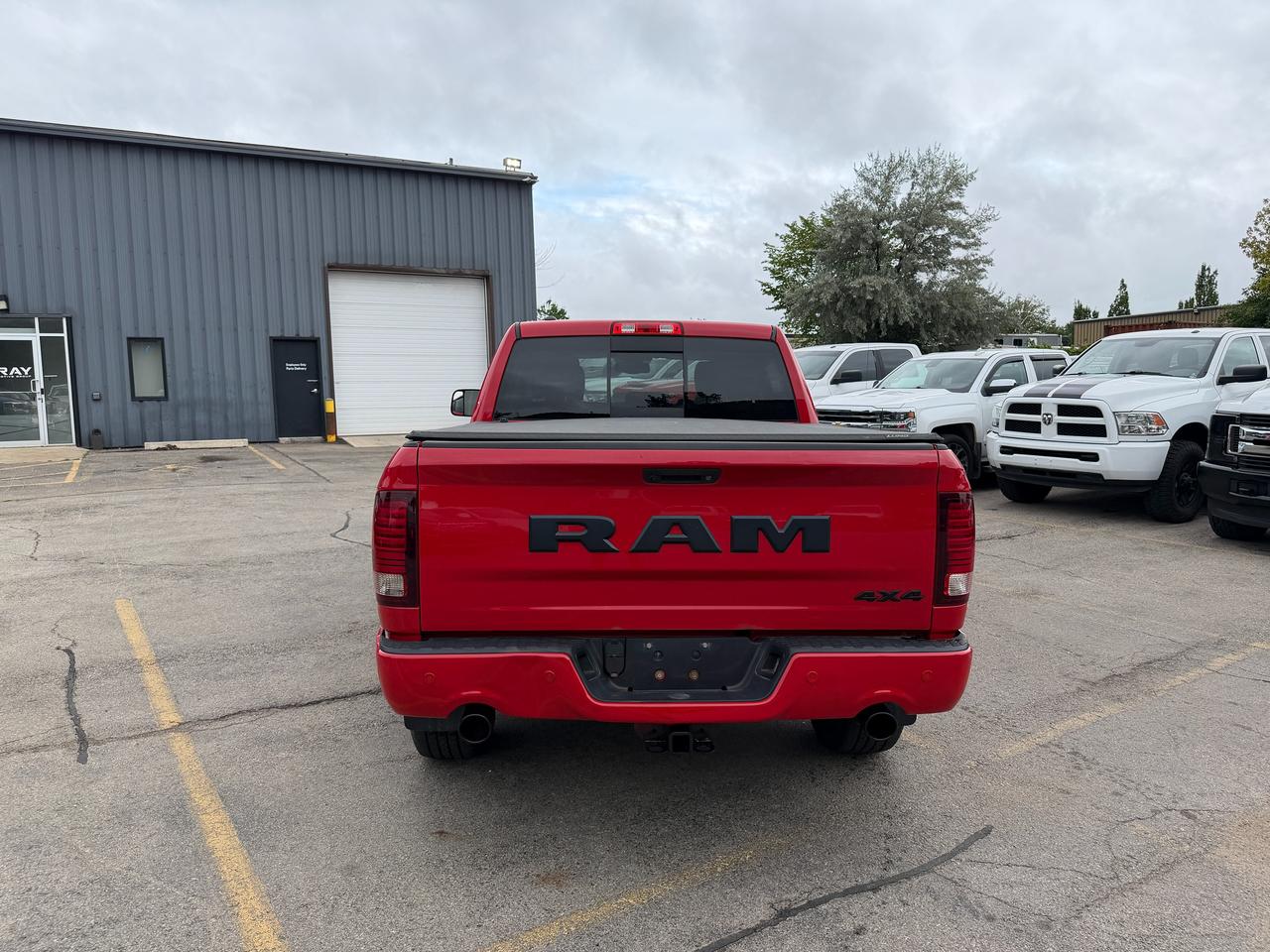 2017 RAM 1500 4WD CREW CAB 140.5" SPORT NIGHT - Stk# 323A Photo