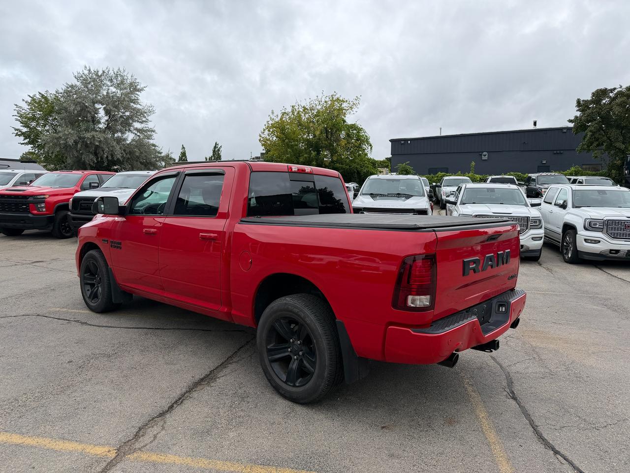2017 RAM 1500 4WD CREW CAB 140.5" SPORT NIGHT - Stk# 323A Photo