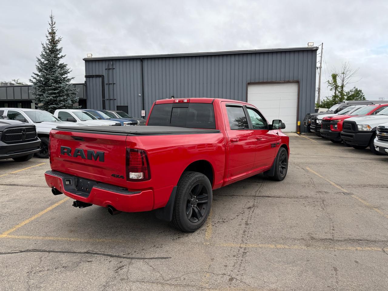 2017 RAM 1500 4WD CREW CAB 140.5" SPORT NIGHT - Stk# 323A Photo