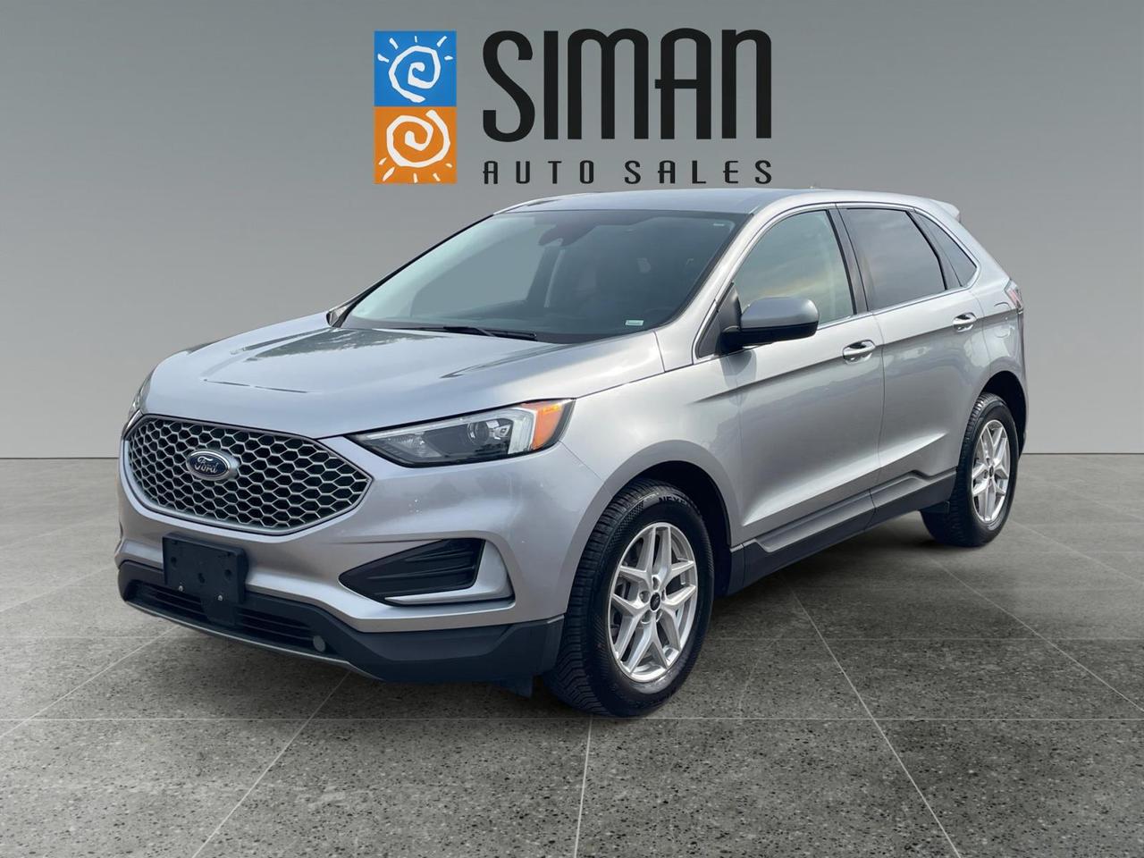 ### **2023 Ford Edge  Well Equipped, Accident Free & Ready to Go!**

Looking for a **well-equipped SUV with the features you want and the confidence of a professionally inspected and fully reconditioned vehicle?** This Ford Edge has **103,400 km** and is **accident free**!

### **Loaded With Features**

* **Alloy wheels**
* **Brand-new tires all around**
* **Power liftgate**
* **Heated leather seats**
* **Heated steering wheel**
* **Backup camera & rear parking sensors**
* **Navigation**
* **SiriusXM radio**
* **Bluetooth connectivity**
* **Apple CarPlay & Android Auto**
* **Blind spot monitoring**
* **Cross-traffic alert**
* **Adaptive/distance cruise control**
* **Lane-keeping assist**

### **Fully Serviced & Ready for the Road**

This Edge has been **freshly Saskatchewan Safety Inspected** and has also had a **complete presale inspection** completed.

Weve just completed:

* **Fresh full synthetic oil service**
* **New air filters**
* **Brand-new tires all around**
* Complete presale inspection

This is a great opportunity to get into a **comfortable, stylish and very well-equipped Ford Edge** that has been properly serviced and reconditioned for its next owner.

### **Why Buy From Siman Auto Sales?**

**Easy financing available on-site through 16 banks and lenders.**
**Trades encouraged  we want your trade!**
**Aftermarket warranties available to fit every need and budget.**

**Siman Auto Sales  large enough to make a difference, small enough to care.**

**Serving Saskatchewan for over 28 years.**
**On-site service with 3 journeyman mechanics.**
**Over 70 vehicles to choose from.**

**Check our reviews and see why Saskatchewan drivers continue to choose Siman Auto Sales!**
