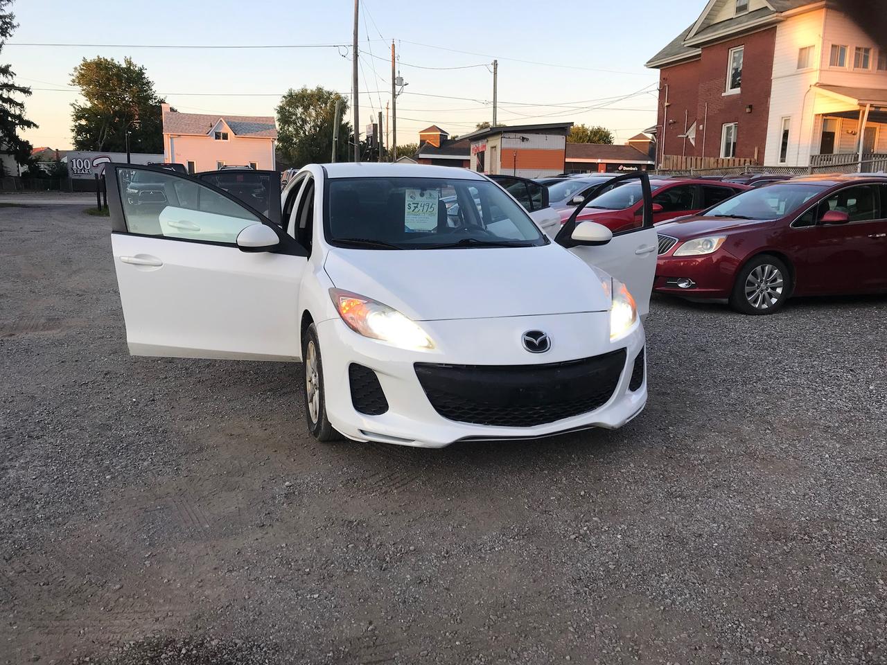 <p>2013 Mazda 3 4 Door Automatic in excellent condition comes certified warranty available power stearing power locks keyless entry power side mirrors ac after market stereo bluetooth back up camera navigagtion hid lights alloy rims clean inside out $7495 plus applicable tax low km 183,400 financing available all credit available bad or good warranty available dealer SHUAIB AUTO 766 SIMCOE STREET SOUTH OSHAWA <a href=tel:647 303 7143>647 303 7143</a> SHUIABAUTO.COM</p>