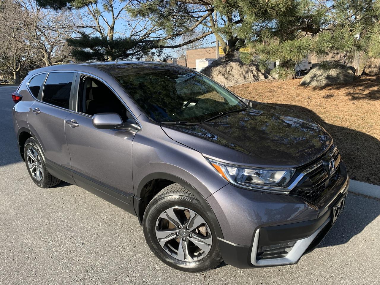 <html>
<p>YES,......ONLY 62,411KMS.!!! NOT A MISPRINT!! </p>
<p>2020 HONDA CRV  LX***ALL WHEEL DRIVE - LOOKS AND DRIVES LIKE NEW!!! </p>
<br>
<p>CARFAX REPORT***CLEAN***NO INSURANCE CLAIMS!!!! </p>
<p>LOCAL ONTARIO FEMALE OWNER - NON SMOKER!!!</p>
<br>
<p>FULLY LOADED!! AUTOMATIC TRANSMISSION, HEATED SEATS, AIR CONDITIONING, BACK-UP CAMERA,  PROXITY/KEYLESS ENTRY/PUSH BUTTON START, PREMIUM SOUND SYSTEM, DUAL CLIMATE CONTROL, CRUISE CONTROL, FOG LIGHTS, ABS, ALLOY WHEELS, APPLE CARPLAY AND MUCH MORE! TOO MUCH TO LIST!!   THE FOLLOWING FEATURES LISTED BELOW ARE ALL INCLUDED IN THE SELLING PRICE: ***CARFAX HISTORY REPORT (CLEAN - NO INSURANCE CLAIMS)! ***ALL ORIGINAL MANUALS AND BOOKS  ***2 PROXIMITY KEYS INCLUDED LICENCE FEE, HST AND OMVIC FEE ($22.00) ARE EXTRA.   NO OTHER (HIDDEN) FEES EVER!  THIS VEHICLE IS BEING SOLD AS IS (NOT CERTIFIED)-PLEASE FEEL FREE TO BRING ALONG YOUR TECHNICIAN TO TEST DRIVE  AND PERFORM A PRE-PURCHASE INSPECTION PRIOR TO PURCHASING!  ***SAFETY CERTIFICATION IS AVAILABLE AT ADDITIONAL COST***  AT THIS PRICE, “This vehicle is being sold “as is,” unfit, not e-tested and is not represented as being in road worthy condition, mechanically sound or maintained at any guaranteed level of quality. The vehicle may not be fit for use as a means of transportation and may require substantial repairs at the purchaser’s expense. It may not be possible to register the vehicle to be driven in its current condition  </p>
<p>PLEASE CALL 416-274-AUTO (2886) TO SCHEDULE AN APPOINTMENT AND TO ENSURE VEHICLE AVAILABILITY. PLEASE CONTACT US TO SCHEDULE AN APPOINTMENT (PRIOR TO VISITING US) AND TO ENSURE THAT THE VEHICLE OF YOUR CHOICE IS STILL AVAILABLE.</p>
<br>
<p>RICHSTONE FINE CARS INC.</p>
<p> 855 ALNESS STREET, UNIT 17</p>
<p>TORONTO, ONTARIO</p>
<p>M3J 2X3</p>
<br>
<p>416-274-AUTO (2886)</p>
<br>
<p>WE ARE AN OMVIC CERTIFIED (REGISTERED) DEALER AND PROUD MEMBER OF THE UCDA.</p>
<br>
<p>SERVING TORONTO, GTA AND CANADA SINCE 2000!!</p>
<br>
<p>WE ALSO ASSIST WITH OUT OF PROVINCE PURCHASES, AS WELL.</p>
<br>
<p>Engine: 4 Cylinder Engine 1.5L</p>
<p>L/100Km City: 8.7</p>
<p>L/100Km Hwy: 7.4</p>
<br>
</html>