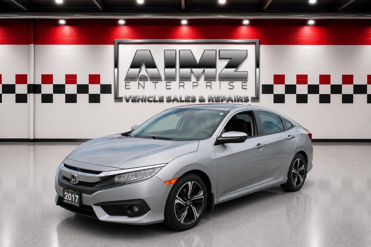 AIMZ ENTERPRISE <br/> Quality Pre-Owned Vehicles | Trusted Service <br/>  <br/> 2017 Honda Civic Touring <br/> Price: $12888 <br/> (Licensing & HST Extra) <br/> Available Now at AIMZ Enterprise <br/> <br/> <br/> <br/> <br/> <br/> <br/>  Vehicle Details <br/> Mileage: 216K <br/> Engine: 1.5L <br/> Transmission: Automatic <br/> Drivetrain: Front Wheel Drive <br/> Fuel Type: Gasoline <br/> Exterior Colour: Silver <br/> Interior Colour: [Black Leather <br/> <br/> <br/> <br/> <br/> Features & Highlights <br/> Power Seats <br/> Heated Seats <br/> 2 Keys <br/> 5 Spoke Wheels <br/> Honda Safety Features <br/> Vehicle Features May Include: <br/> Bluetooth & Hands-Free Calling <br/> Backup Camera <br/> Navigation System <br/> Heated Seats <br/> Sunroof / Moonroof <br/> Leather Interior <br/> Alloy Wheels <br/> Push Button Start <br/> Remote Start <br/> Advanced Safety Features <br/> (Features vary by vehicle) <br/>  <br/> Contact AIMZ Enterprise <br/> Ready to see it? Contact us today! <br/> 5153 Steeles Ave W <br/> North York, Ontario <br/> M9L 1R5 <br/> 416-749-7707 <br/> www.aimzenterprise.com <br/> Business Hours: <br/> Monday  Friday: 10AM  7PM <br/> Saturday: 10AM  6PM <br/> Sunday: By Appointment Only <br/> <br/> <br/> <br/> <br/> Financing, Certification & Warranty Options <br/> Financing Available  Rates Starting From 7.99% O.A.C. <br/> Flexible Financing Options Available <br/> Extended Warranty Coverage Available (3 Months to 2 Years) <br/> Trade-Ins Welcome <br/> Carfax Vehicle History Reports Available <br/> Test Drives Available <br/> <br/> <br/> <br/> <br/> Safety Certification <br/> All vehicles, unless otherwise specified, can be certified at the following rates: <br/> Sedans & SUVs: $599 <br/> Pickup Trucks & Large Vans: $799 <br/>  Specialty Vehicles / Class 3 Vehicles: $999 <br/> Certification ensures the vehicle meets Ontario safety standards and is ready for registration and road use. <br/> Certification fees are additional and are not included in the advertised vehicle price. <br/> <br/> <br/> <br/> <br/> <br/> <br/>  Why Choose AIMZ Enterprise? <br/> At AIMZ Enterprise, we are committed to providing a simple, transparent, and reliable vehicle buying experience. <br/> Quality Pre-Owned Inventory <br/> We carefully select and recondition our vehicles to deliver dependable transportation. <br/> Transparent Vehicle History <br/> Every vehicle comes with available Carfax reporting so you can buy with confidence. <br/> Competitive Pricing <br/> We work hard to offer vehicles priced fairly in todays market. <br/> Customer-Focused Service <br/> Our team is here to make your purchase experience smooth from start to finish. <br/> AIMZ Enterprise  Quality Vehicles. Honest Service. Confident Driving. <br/> Licensing and HST are not included in advertised pricing. Prices are subject to change without notice. <br/>
