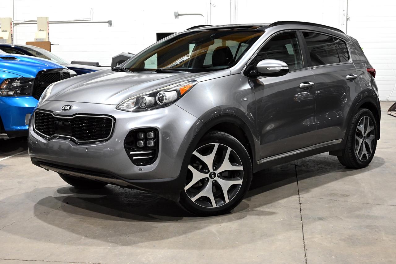 <p><span>Financing & Warranty Available!</span><span><br></span><span><br></span><span>Accident Free! - Consistent Service Records!</span><span><br><br></span><span>Key Features:</span><span><br></span><span><br></span><span>- All-Wheel Drive (AWD)<br>- Heated & Cooled Front Seats<br>- Heated Steering Wheel<br>- Harman Kardon 320-Watt Premium Audio System<br>- Panoramic Moonroof<br>- Remote Start<br>- Android Auto / Apple Carplay<br>- Rearview Camera<br>- 8 Touch Screen Infotainment System<br>- Windshield Wiper De-Icer<br>- Dual-Zone Automatic Climate Control<br>- Automatic Defog System<br>- Smart Key w/ Push-Button Start<br>- 7-Inch LCD Audio Display<br>- SiriusXM Satellite Radio<br>- USB & AUX Input Jacks<br>- Automatic Power-Folding Heated Sideview Mirrors<br>- Power-Adjustable Drivers Seat<br>- Leather-Wrapped Steering Wheel & Shift Knob<br>- Auto-Dimming Rearview Mirror<br>- Bi-Xenon HID Headlights<br>- LED Daytime Running Lights<br>- LED Taillights<br>- Projection Fog Lights<br>- Parking Sensor<br>- Sport Tuned Suspension<br>- Roof Rails<br>- Power Liftgate<br>- Blind-spot Detection<br>- Lane Departure Warning<br>- Forward Collision Warning System<br>- Rear Cross-Traffic Alert<br>- Universal Garage Door Opener<br>- Drive Mode Select (Eco/Normal/Sport)<br>- 19-Inch Machined-Finish Alloy Wheels<br>- 2.0L Turbocharged 4-Cylinder Engine<br><br><span>Exterior Colour:</span> Mineral Silver<br><span>Interior Colour:</span> Black Leather<br><br><span>Manufacturers Brochure:</span> https://www.auto-brochures.com/makes/Kia/Sportage/Kia_US%20Sportage_2018.pdf</span><br><br><span>Unlock a full year of exclusive VIP benefits with your purchase! Enjoy 20% off labour, 25% off tires, free windshield stone chip repairs, and so much more. Visit saskatoonauto.ca for all the details.<br></span><span><br>Honesty Pricing eliminates the haggle hassle by providing you with our lowest possible selling price up front. In fact, it is the lowest price in our market, and we will prove it by disclosing a comprehensive market report of what our competitors are selling similar vehicles for.<br></span><span><br>This vehicle meets our Diamond Certification standard, which begins by selecting only premium quality vehicles and subjecting them to a much more comprehensive inspection process than typical dealerships use. Diamond Certified ensures a clean history, exceptional appearance and problem-free operation.<br></span><span><br>At Saskatoon Auto Connection we sell pre-owned automobiles the way we would like to buy them ourselves. Since 2008, we have been dedicated to providing the highest level of integrity and transparency in our industry, in combination with the highest quality vehicles at the most competitive prices in Saskatchewan. Our friendly staff is ready to positively redefine your expectations of the pre-owned automobile space.</span></p>