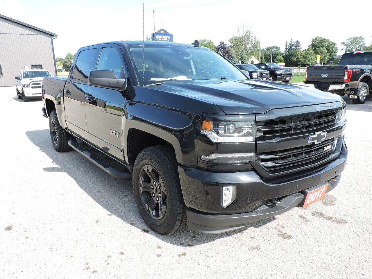 <p>A beautiful 1-owner 2017 Silverado 1500 LTX that is powered by a 5.3L V8, 4-wheel drive, 8-speed automatic transmission and 3:42 gear ratio with Limited Slip in both rear ends. Heated and cooled leather seats and heated steering wheel. Sunroof and power rear sliding window. Navigation, back-up camera, both front and rear park assist systems. Bluetooth, steering wheel mounted audio controls, Bose speaker system and a CD player. Collision avoidance and lane departure warning system options. Remote start, built-in electric brake controller, power adjust pedals and Z71 Off Road suspension system. Spray in box liner and a hard folding tonneau cover were added to the 5-foot 9-inch length box. A must-see 1500 LTZ.&nbsp;</p><p>** WE UPDATE OUR WEBSITE REGULARLY IF YOU SEE THIS AD THE VEHICLE IS AVAILABLE! ** Pentastic Motors specializes in 4X4 Gasoline and Diesel trucks from all makes including Dodge, Ford, and General Motors. Extended warranties available! &nbsp;Financing available from 7.99% APR OAC. Delivery available to Southern Ontario Purchasers! We are 1.5 hrs from Pearson International Airport and offer free pick up from the airport to Purchasers. Leasing options available for Commercial/Agricultural/Personal! **NO ADMIN FEES! All vehicles are CERTIFIED and serviced unless otherwise stated! CARFAX AVAILABLE ON ALL VEHICLES! ** Call, email, or come in for a test drive today! 1-844-4X4-TRUX www.pentasticmotors.com</p><p>&nbsp;</p><p>&nbsp;</p>
