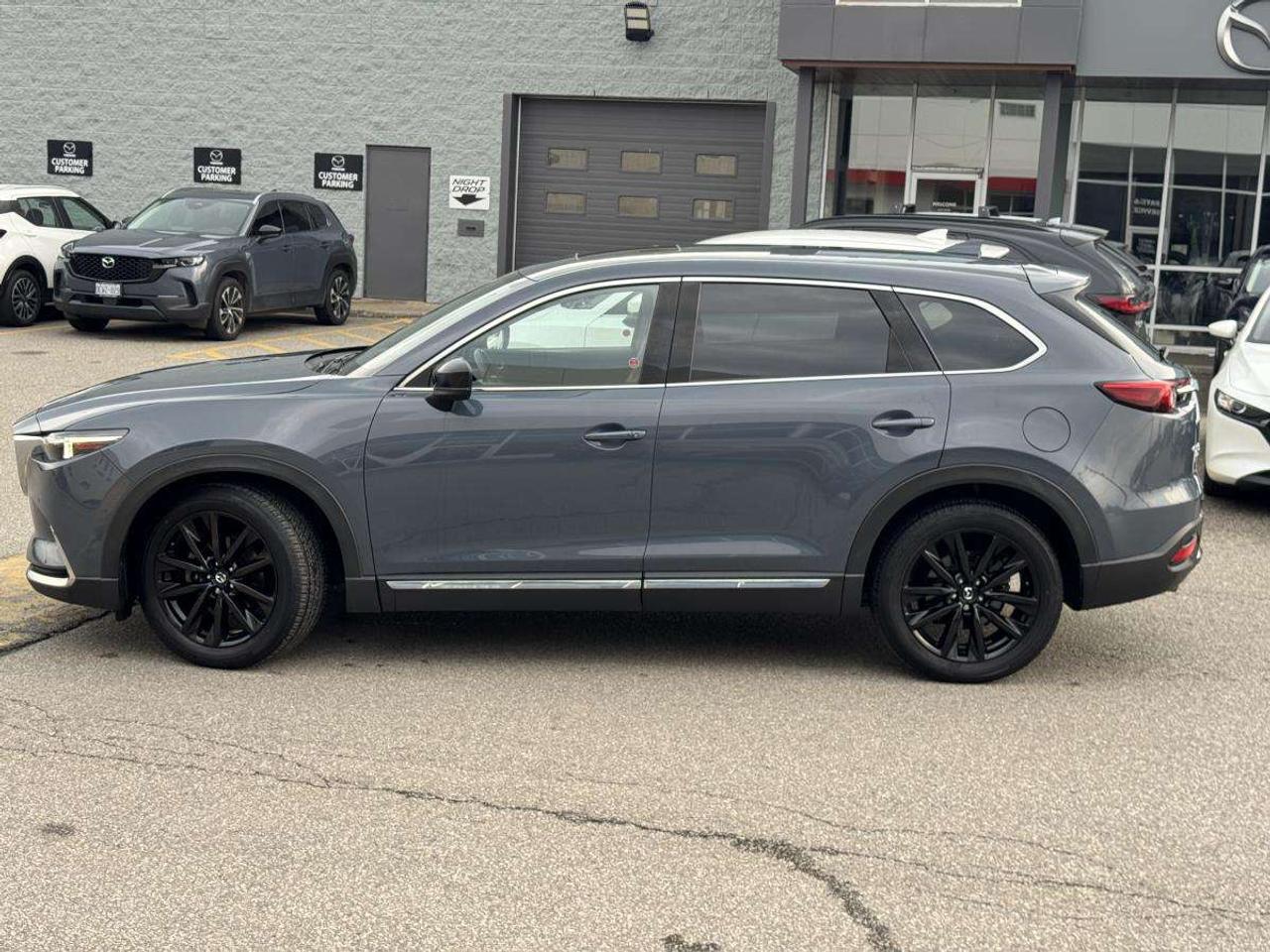 2022 Mazda CX-9 KURO AWD/ BOSE SOUND/ RED LEATHER INTERIOR/ 2.99% Photo