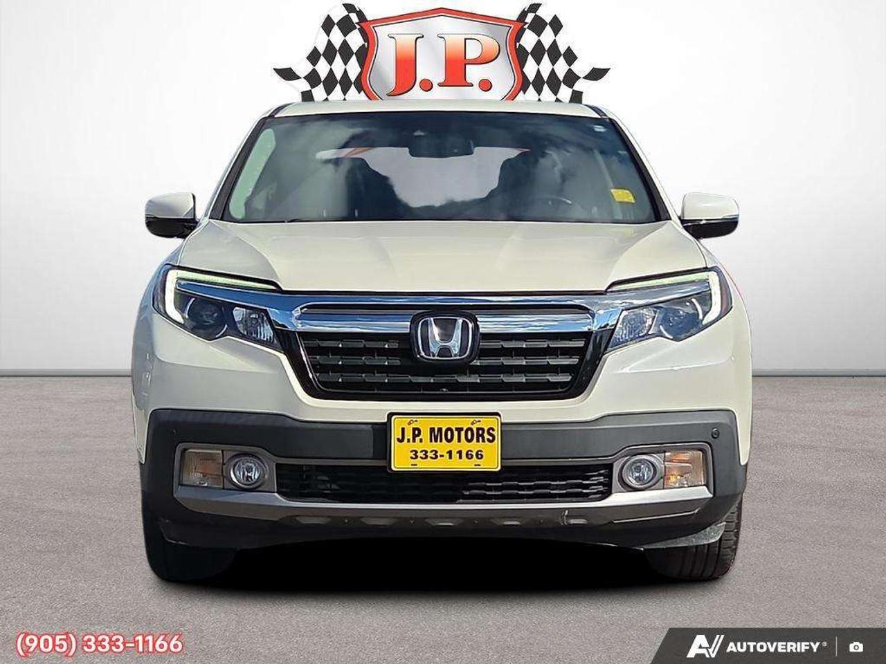 2019 Honda Ridgeline Touring Apple CarPlay & Android Auto • Power Sunroof • Heated & Cooled Seats • Remote Start System • Navigation System • Photo1
