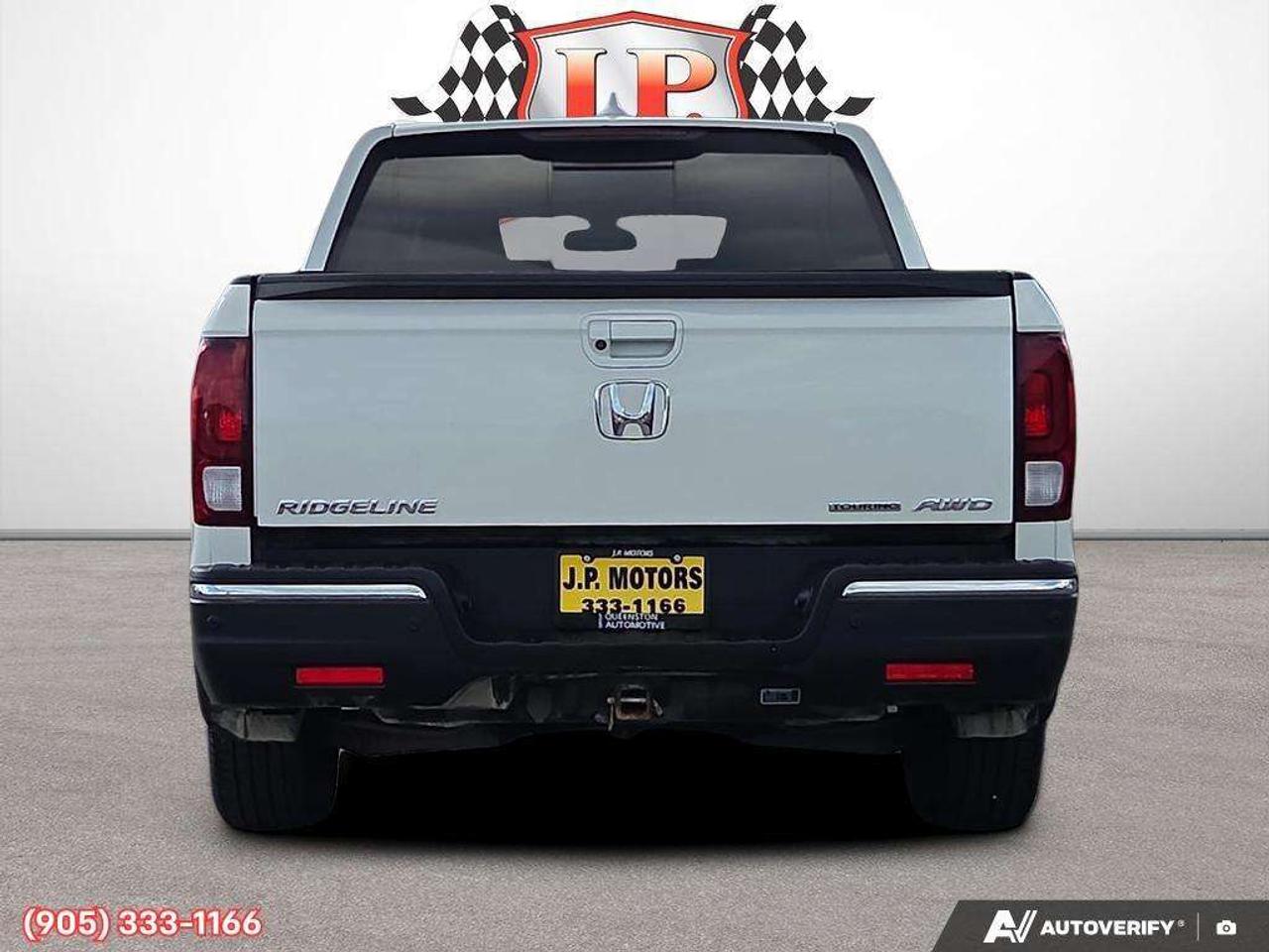 2019 Honda Ridgeline Touring Apple CarPlay & Android Auto • Power Sunroof • Heated & Cooled Seats • Remote Start System • Navigation System • Photo