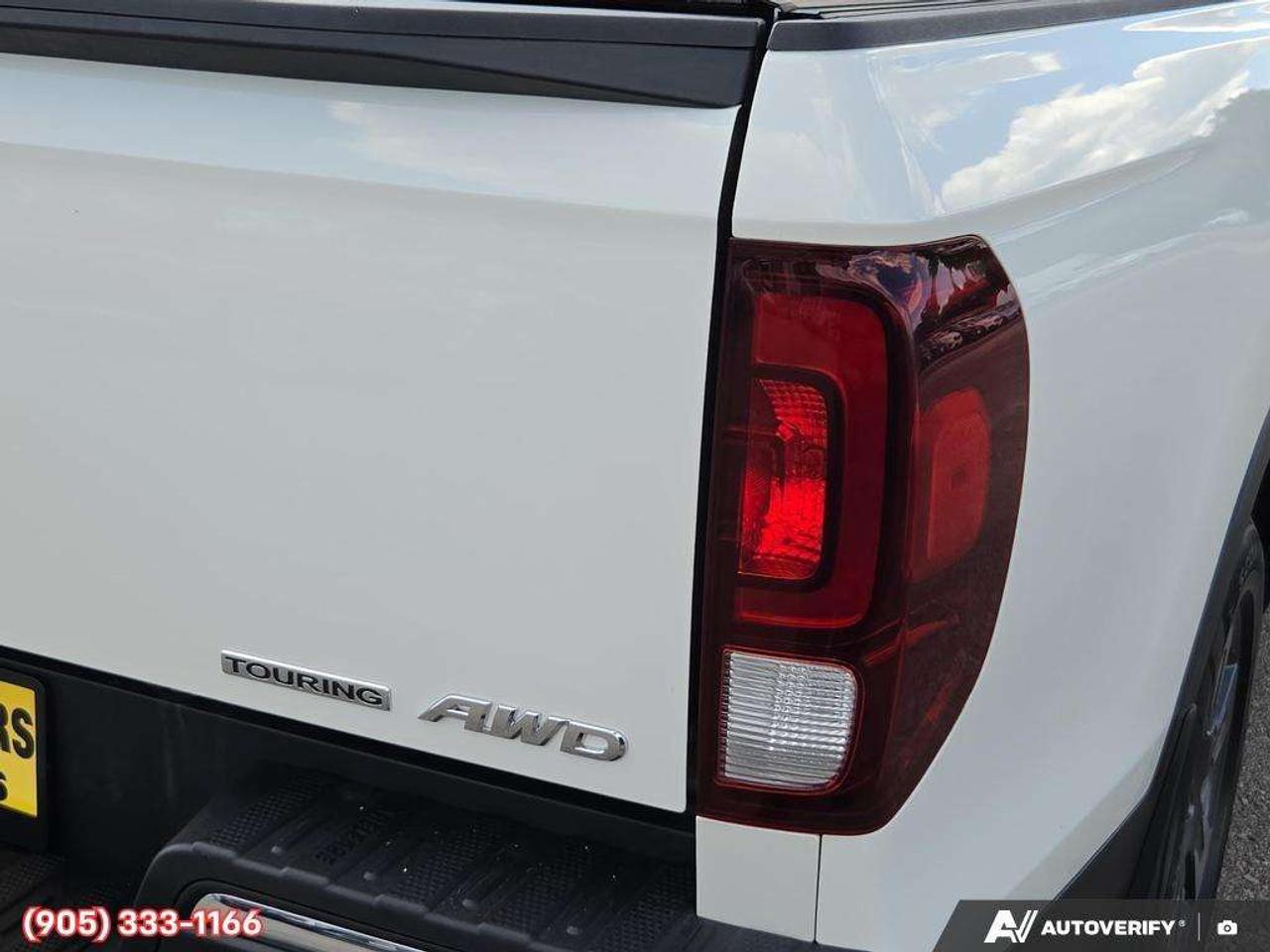2019 Honda Ridgeline Touring Apple CarPlay & Android Auto • Power Sunroof • Heated & Cooled Seats • Remote Start System • Navigation System • Photo