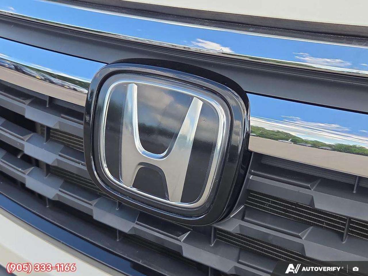 2019 Honda Ridgeline Touring Apple CarPlay & Android Auto • Power Sunroof • Heated & Cooled Seats • Remote Start System • Navigation System • Photo