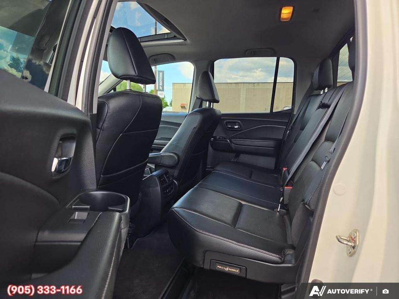 2019 Honda Ridgeline Touring Apple CarPlay & Android Auto • Power Sunroof • Heated & Cooled Seats • Remote Start System • Navigation System • Photo