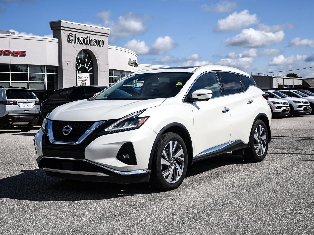 2021 Nissan Murano 4D Sport Utility SL Pearl White CVT with Xtronic, AWD, 11 Speakers, 4-Wheel Disc Brakes, ABS brakes, Air Conditioning, Alloy wheels, AM/FM radio: SiriusXM, Auto High-beam Headlights, Auto-dimming Rear-View mirror, Automatic temperature control, Blind Spot Warning, Brake assist, CD player, Delay-off headlights, Dual front impact airbags, Dual front side impact airbags, Electronic Stability Control, Four wheel independent suspension, Front anti-roll bar, Front Bucket Seats, Front dual zone A/C, Front fog lights, Fully automatic headlights, Heated Front Bucket Seats, Heated front seats, Heated rear seats, Heated steering wheel, Knee airbag, Leather Appointed Seat Trim, Memory seat, Navigation system: NissanConnect Navigation, NissanConnect featuring Apple CarPlay and Android Auto, Occupant sensing airbag, Overhead airbag, Power driver seat, Power Liftgate, Power moonroof, Power passenger seat, Power windows, Radio data system, Radio: AM/FM/CD/MP3/WMA NissanConnect w/Navigation, Rear anti-roll bar, Rear side impact airbag, Rear window wiper, Remote keyless entry, Security system, Steering wheel mounted audio controls, Telescoping steering wheel, Tilt steering wheel, Traction control, Variably intermittent wipers. AWD 3.5L 6-Cylinder DOHC 24V CVT with Xtronic<br /><br /><br />Awards:<br /> * JD Power Initial Quality Study (IQS)<br /><br /><br />Here at Chatham Chrysler, our Financial Services Department is dedicated to offering the service that you deserve. We are experienced with all levels of credit and are looking forward to sitting down with you. Chatham Chrysler Proudly serves customers from London, Ridgetown, Thamesville, Wallaceburg, Chatham, Tilbury, Essex, LaSalle, Amherstburg and Windsor with no distance being ever too far! At Chatham Chrysler, WE CAN DO IT!