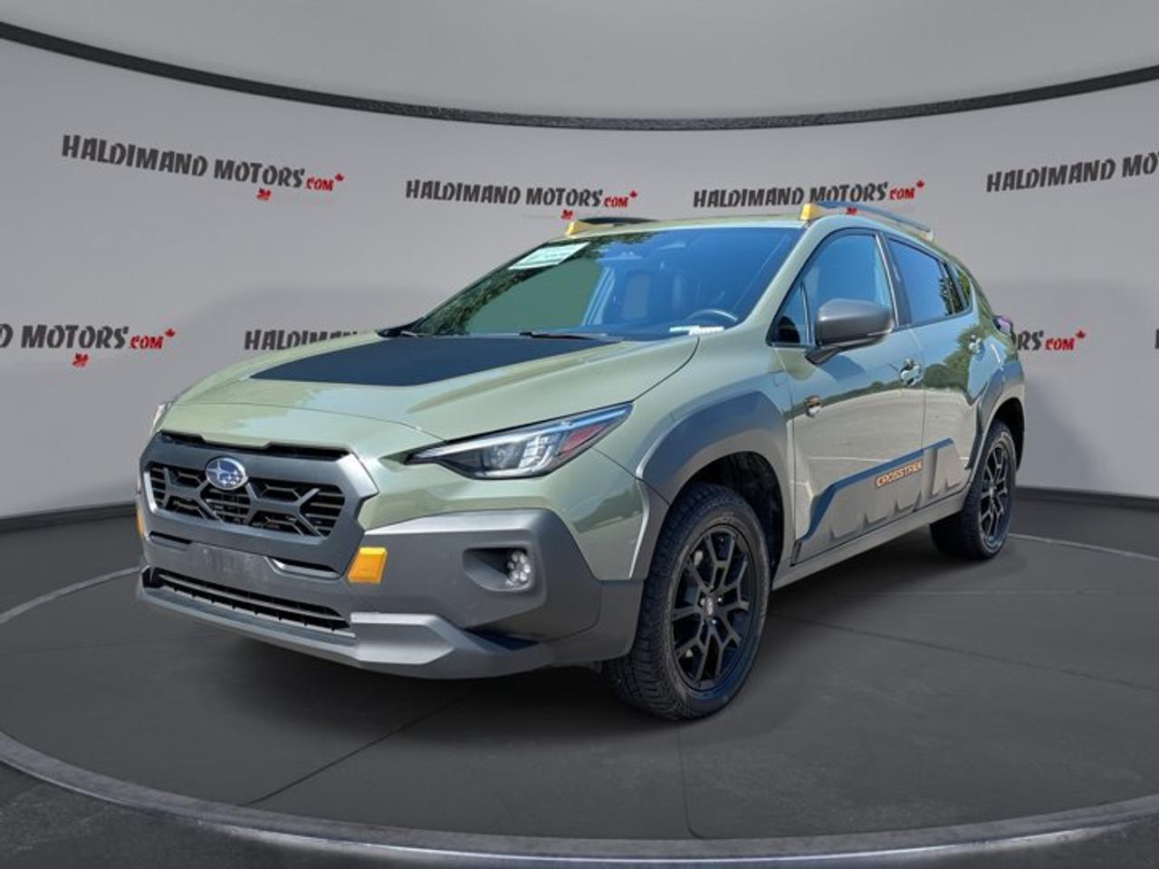 // ACCIDENT FREE!! //<br /><br />Built for drivers who want extra confidence on rough roads, this 2025 Subaru Crosstrek Wilderness AWD offers a smart mix of capability, comfort, and everyday ease. Finished in green with a black interior, this used SUV stands out with a sunroof, heated steering wheel, and proven Subaru all-wheel drive.<br /><br />Sold by Haldimand Motors Ltd. in Cayuga, this accident-free 2025 Subaru Crosstrek Wilderness AWD is powered by a 2.5-litre gas engine paired with a CVT automatic transmission. With 73,765 km, four doors, and a practical cabin, it is ready for commuting, weekend travel, and changing Ontario weather.<br /><br />FEATURES OF THE Crosstrek Wilderness AWD | No Accidents | Sunroof | Heated Steering<br />   Standard all-wheel drive for year-round traction<br />   Sunroof adds light and fresh air<br />   Heated steering wheel boosts winter comfort<br />   Off-road tires support adventurous driving<br /><br />ADVANCED SAFETY FEATURES<br />   Backup camera helps with reversing confidence<br />   Lane departure warning supports safer highway travel<br />   Blind spot monitor adds lane-change awareness<br />   Multiple airbags enhance passenger protection<br /><br />PERFORMANCE AND EFFICIENCY<br />   2.5-litre gas engine delivers smooth power<br />   CVT automatic supports relaxed daily driving<br />   All-wheel drive improves traction in weather<br />   Limited slip differential aids uneven surfaces<br /><br />COMFORT AND CONVENIENCE<br />   Heated front seats warm cold mornings<br />   Heated steering wheel adds winter comfort<br />   Dual-zone climate control helps cabin comfort<br />   Power driver seat includes lumbar support<br /><br />TECHNONOLGY AND CONNECTIVITY<br />   Apple CarPlay keeps apps within reach<br />   Android Auto supports easy smartphone integration<br />   Bluetooth integration enables hands-free communication<br />   Steering wheel audio controls simplify use<br /><br />CARGO SPACE<br />   Rear trunk access makes loading easier<br />   Cargo cover helps keep items concealed<br />   Four-door layout improves passenger entry<br />   Spare tire adds roadside reassurance<br /><br />AWARDS & RECOGNITIONS<br />   Top Safety Pick, Insurance Institute for Highway Safety, 2024<br /><br />WHAT OTHER OWNERS LIKE<br />   Confident all-wheel drive in changing weather<br />   Easy-to-use infotainment with smartphone connectivity<br />   Comfortable ride for daily driving needs<br />   Practical size with useful cargo flexibility<br /><br />The 2025 Subaru Crosstrek Wilderness AWD feels ready for real life. Its raised confidence comes from Subaru all-wheel drive, off-road tires, and a responsive 2.5-litre engine. Around town, the CVT keeps the drive smooth and easy, while adaptive cruise control helps reduce stress on longer trips.<br /><br />Inside, the 2025 Subaru Crosstrek Wilderness AWD gives you the features drivers use most. Heated front seats, a heated steering wheel, front air conditioning, automatic climate control, and dual-zone climate control all help make every season easier. The power drivers seat with lumbar support adds welcome comfort on busy days.<br /><br />Daily usability is also a big strength in this 2025 Subaru Crosstrek Wilderness AWD. Power windows, power steering, push-button start, automatic headlights, heated mirrors, electric mirrors, and remote trunk release all work together to make each drive more convenient. Tinted windows and a rear spoiler add a sporty, purposeful touch.<br /><br />For entertainment and connection, the 2025 Subaru Crosstrek Wilderness AWD includes Apple CarPlay, Android Auto, Bluetooth integration, satellite radio, and HD Radio. The controls are easy to reach, and steering wheel audio controls help you keep your focus where it belongs while staying connected on the move.<br /><br />Safety matters, and this 2025 Subaru Crosstrek Wilderness AWD brings a solid list of helpful features. It includes anti-lock braking system, stability control, driver and passenger airbags, side impact airbags, head side airbags, child safety locks, a passenger airbag sensor, blind spot monitor, lane departure warning, and a backup camera.<br /><br />This green 2025 Subaru Crosstrek Wilderness AWD is a smart choice for drivers who want comfort, traction, and everyday versatility in one well-equipped package. It is practical for family use, enjoyable for weekend escapes, and well suited to Canadian roads through every season.<br /><br />This 2025 Subaru Crosstrek Wilderness AWD | No Accidents | Sunroof | Heated Steerings VIN is: 4S4GUHU68S3703617.<br /><br />WHY CHOOSE US? <br /><br />Honest & Transparent Buying Experience: Weve been a trusted name in business since 1984.<br /><br />STRAIGHTFORWARD PRICING:<br />Our Advertised Price Includes:<br />>>Safety Certification (No separate fee!)<br />>>30-Day 100% Mechanical Warranty<br />>>FREE Carfax History Report.<br />>>No upcharge for paying cash.<br />(Prices Exclude HST and Licensing Fees only.)<br /><br />>>Browse 300+ vehicles all in ONE LOCATION<br /><br />EASY FINANCING: Great rates & open loans<br /><br />WE BUY CARS: Get Top Dollar for your trade-in, or sell us your vehicle for CASH! Even if you dont buy from us!<br /><br />STOP BY TODAY<br />Treat yourself - stop by Haldimand Motors Ltd. located at 42 Talbot St E, Cayuga, ON N0A 1E0 to make this car yours today!<br /><br />https://www.haldimandmotors.com/used/stock-461142.html