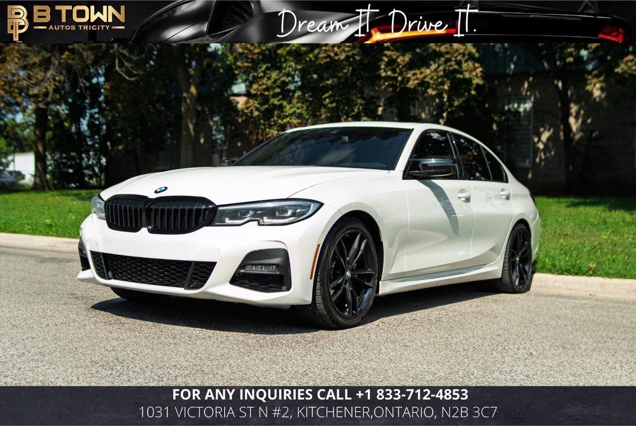 <strong>2021 BMW 330i xDrive M Sport Sedan</strong>




<span>Finished in </span><strong>White over a Black interior, this 2021 BMW 330i xDrive M Sport</strong><span><strong> combines athletic styling, premium comfort, and confident all-weather performance</strong>. The </span><span>M Sport Package</span><span> adds a more aggressive exterior appearance and driver-focused interior details, giving this luxury sedan a distinctive and engaging character.</span>




<span>Powered by a </span><strong>2.0L TwinPower Turbocharged 4-Cylinder engine producing 255 horsepower, paired with an 8-Speed Sport Automatic Transmission and xDrive All-Wheel Drive</strong><span><strong>,</strong> the 330i delivers responsive acceleration, precise handling, and refined everyday comfort. With </span><span>87,776 KM</span><span>, it is ready for its next owner.</span>




<strong>Factory Options & Features:</strong>

<span>&bull; M Sport Package

&bull; M Aerodynamic Exterior Styling

&bull; M Sport Steering Wheel

&bull; Sport Seats

&bull; 2.0L TwinPower Turbo 4-Cylinder &ndash; 255 HP

&bull; 8-Speed Sport Automatic Transmission

&bull; xDrive All-Wheel Drive

&bull; Heated Front Seats

&bull; Heated Steering Wheel

&bull; Power Front Seats with Driver Memory

&bull; Power Sunroof

&bull; BMW Live Cockpit

&bull; Navigation System

&bull; Apple CarPlay & Android Auto

&bull; Dual-Zone Automatic Climate Control

&bull; Rear View Camera

&bull; Front & Rear Parking Sensors

&bull; Blind Spot Monitoring

&bull; Lane Departure Warning

&bull; LED Headlights

&bull; M Sport Alloy Wheels</span>




<strong>

At B-Town Auto Tricty, each vehicle undergoes a comprehensive inspection to ensure exceptional quality and performance. We proudly serve customers across the Greater Toronto Area and beyond, offering competitive financing, trade-ins, and nationwide shipping.</strong>




<strong>$999* FINANCING FEES APPLY.</strong>




<strong>Special Financing Price: $30,888</strong>

<strong>Cash Price: $32,388</strong>




<strong>Thank you for choosing B-Town Auto Tricity.</strong>