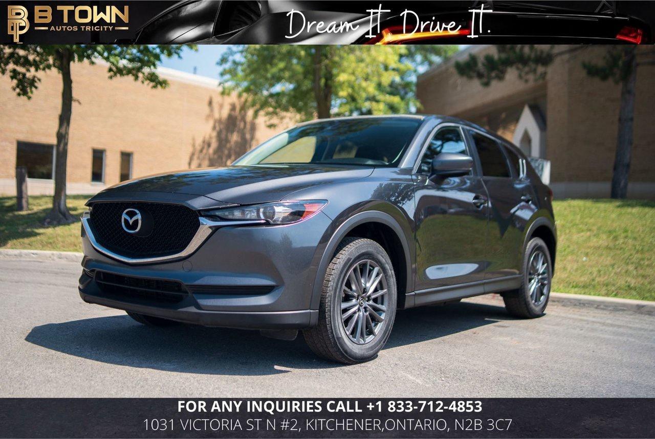 <strong>2019 Mazda CX-5 Sport AWD</strong>

<span>

Finished in </span><strong>Charcoal, this 2019 Mazda CX-5 Sport AWD</strong><span><strong> offers a perfect balance of sporty performance, premium comfort, and everyday practicality.</strong> With Mazda&rsquo;s signature KODO design, refined interior, and responsive handling, the CX-5 delivers an engaging driving experience in a versatile SUV.</span>




<span>Powered by a </span><strong>2.5L SKYACTIV-G 4-Cylinder engine producing 187 horsepower, paired with a 6-Speed Automatic Transmission and i-Activ All-Wheel Drive</strong><span><strong>,</strong> the CX-5 provides confident handling, smooth performance, and excellent fuel efficiency. With </span><span>173,900 KM</span><span>, this SUV is ready for its next owner.</span>

<span>

<strong>Key Features & Factory Options</strong></span>

<span>&bull; </span><span>2.5L SKYACTIV-G 4-Cylinder &ndash; 187 HP</span><span>

&bull; 6-Speed Automatic Transmission

&bull; i-Activ All-Wheel Drive (AWD)

&bull; Sport Package

&bull; Heated Front Seats

&bull; Heated Steering Wheel

&bull; Leather-Wrapped Steering Wheel & Shift Knob

&bull; Mazda Connect Infotainment System

&bull; Apple CarPlay&reg; & Android Auto&trade;

&bull; Rear View Camera

&bull; Blind Spot Monitoring

&bull; Rear Cross Traffic Alert

&bull; Smart City Brake Support

&bull; Adaptive Cruise Control

&bull; Lane Departure Warning

&bull; Push Button Start

&bull; Dual-Zone Automatic Climate Control

&bull; LED Headlights

&bull; Rain-Sensing Wipers

&bull; 17-Inch Alloy Wheels</span>







<strong>At B-Town Auto Tricity, each vehicle undergoes a comprehensive inspection to ensure exceptional quality and performance. We proudly serve customers across the Greater Toronto Area and beyond, offering competitive financing, trade-ins, and nationwide shipping.</strong>




<strong>$999* FINANCING FEES APPLY.</strong>




<strong>Special Financing price: $15,888&nbsp;</strong>

<strong>Cash Price: $ 17,388</strong>




<strong>Thank you for choosing B-Town Auto Tricity.</strong>