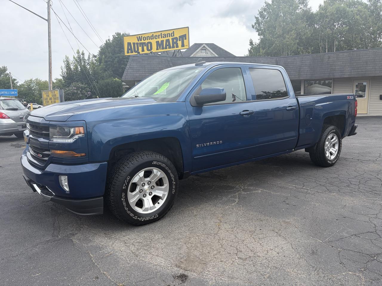 <p>Looking for a robust and reliable truck that can handle anything you throw at it? Look no further than this exceptional used 2017 Chevrolet Silverado 1500 LT-4X4-5.3-V8, available now at Wonderland Auto Mart. This iconic pickup, presented in a striking blue exterior and a sleek black interior, is ready to conquer your workday and your weekend adventures. With its powerful 5.3L V8 engine and legendary 4-wheel drive capability, this Silverado is built for performance and built to last.</p><p>This 2017 Silverado 1500 LT has seen its share of adventures, with 231,815 km on the odometer, attesting to its enduring quality and capability. It&rsquo;s a testament to Chevrolet&rsquo;s engineering that this truck still has so much life left to offer. Whether youre hauling equipment for a job site, towing your boat for a weekend getaway, or navigating challenging Canadian terrain, this Silverado 1500 LT is more than up to the task. Visit Wonderland Auto Mart today to experience the commanding presence and proven performance of this fantastic truck.</p><p>Here are 5 features that truly make this 2017 Chevrolet Silverado 1500 LT a standout:</p><ul><li><strong>Legendary 5.3L V8 Engine:</strong> Unleash the power and torque you need for serious hauling, towing, and an exhilarating driving experience.</li><li><strong>4-Wheel Drive Capability:</strong> Conquer any road condition, from slippery winter roads to challenging off-road trails, with confidence.</li><li><strong>LT Trim Level:</strong> Enjoy a well-appointed interior and a host of desirable features designed for comfort and convenience.</li><li><strong>Rugged Pickup Truck Design:</strong> Benefit from the versatility and utility only a true pickup truck can offer, ready for work and play.</li><li><strong>Dependable Automatic Transmission:</strong> Experience smooth gear changes and effortless cruising, making every drive a pleasure.</li></ul><p><strong><em>Powered by AutoIntelligence&trade;</em></strong></p><p>Vehicle information has been generated using artificial intelligence and is provided for informational purposes only. While efforts are made to ensure accuracy, please confirm all details directly with the dealer.</p>