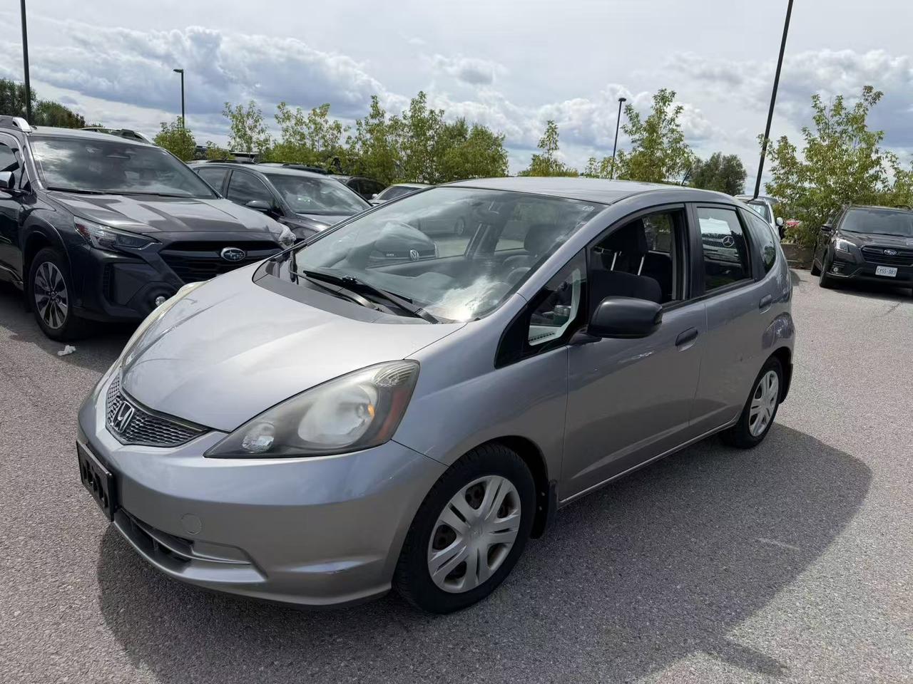 2009 Honda Fit 5dr HB Man DX-A - Photo #1