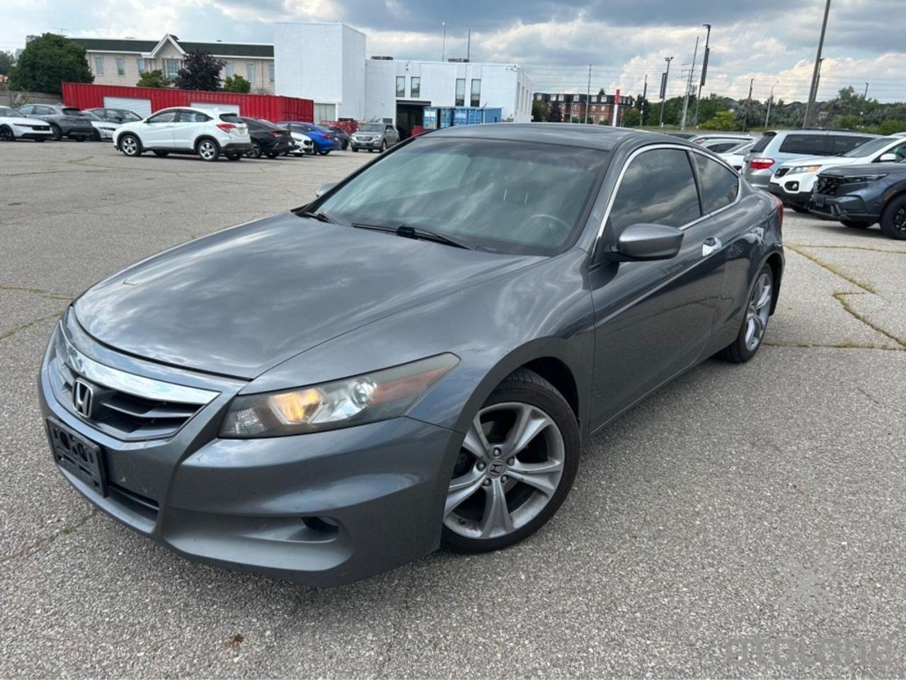 ** ** SPECIAL LIMITED TIME OFFER ** ** PURCHASE ANY VEHICLE THIS WEEK AND RECEIVE 4 BRAND-NEW ALL-SEASON TIRES AT NO ADDITIONAL COST!!! DON   T MISS THIS EXCLUSIVE CHANCE TO UPGRADE YOUR RIDE AND STAY PREPARED FOR ANY WEATHER!!! <br><br>EXCITING NEWS FROM FIRST CHOICE MOTORS! Our brand-new online showroom is now open to the public, bringing the ultimate car shopping experience right to your fingertips! Enjoy a 100% online car shopping experience, with over 500 certified vehicles in stock, comprehensive protection plans, and thousands of new auto parts & accessories available! Plus, for a limited time, were offering FREE deliveries across Ontario on all vehicle purchases! Dont miss out   visit Shop.fcmotors.ca to find and upgrade your perfect vehicle today!<br><br>Welcome to First Choice Motors, the largest car dealership in Toronto of pre-owned cars, SUVs, and vans priced between $5000-$15,000. With an impressive inventory of over 300 vehicles in stock, we are dedicated to providing our customers with a vast selection of affordable and reliable options. <br><br>Were thrilled to offer a used 2012 Honda Accord Coupe EX-L, grey color with 368,000km (STK#10235) This vehicle was $5990 NOW ON SALE FOR $5490. It is equipped with the following features:<br>- Automatic Transmission<br>- Leather Seats<br>- Sunroof<br>- Heated seats<br>- Navigation<br>- Alloy wheels<br>- Power windows<br>- Power locks<br>- Power mirrors<br>- Air Conditioning<br><br>At First Choice Motors, we believe in providing quality vehicles that our customers can depend on. All our vehicles come with a 36-day guarantee on all safety related items. We also offer additional warranty options up to 5 years for our customers who want extra peace of mind.<br><br>Furthermore, all our vehicles are sold fully certified with brand new brakes rotors and pads, a fresh oil change, and brand new set of all-season tires installed & balanced. You can be confident that this car is in excellent condition and ready to hit the road.<br><br>At First Choice Motors, we believe that everyone deserves a chance to own a reliable and affordable vehicle. Thats why we offer financing options with low interest rates starting at 7.9% O.A.C. Were proud to approve all customers, including those with bad credit, no credit, students, and even 9 socials. Our finance team is dedicated to finding the best financing option for you and making the car buying process as smooth and stress-free as possible.<br><br>Our dealership is open 7 days a week to provide you with the best customer service possible. We carry the largest selection of used vehicles for sale under $9990 in all of Ontario. We stock over 300 cars, mostly Hyundai, Chevrolet, Mazda, Honda, Volkswagen, Toyota, Ford, Dodge, Kia, Mitsubishi, Acura, Lexus, and more. With our ongoing sale, you can find your dream car at a price you can afford. Come visit us today and experience why we are the best choice for your next used car purchase!<br><br>All prices include $22.00 OMVIC Fee.  Excludes, license plates, ownership registration and ONTARIO HST (13%)<br>*No Credit Card payments can be accepted for Vehicle Purchases*