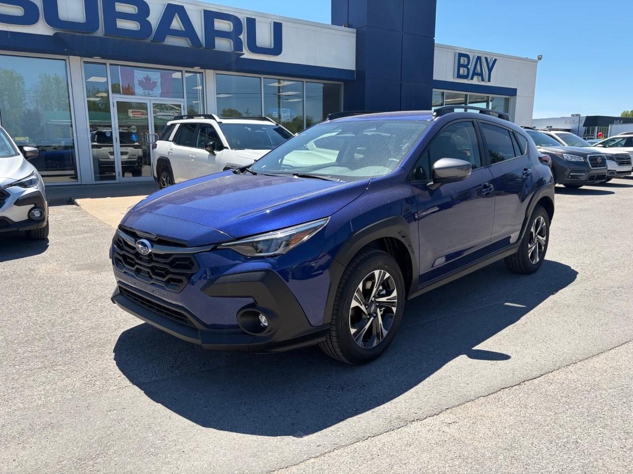 <p>Price includes all fees and taxes, and the following installed accessories: Rear Bumper Cover, Security Package and Wheel Lock Kit, HST and licensing fees are extra.</p><p> </p><p>Use this link to view the brochure for the Crosstrek – <a target=_blank rel=noopener noreferrer nofollow href=https://joom.ag/k5vd><u>https://joom.ag/k5vd</u></a>.</p><p> </p><p>Crosstrek Touring features include, 17-inch aluminum alloy wheels, 5-spoke, two-tone with machined finish, LED fog lights, Heated front seats and leather wrapped heated steering wheel, an 11.6-inch touch-screen infotainment system with wireless Apple CarPlay® and Android Auto™ functionality, 6 speakers and SiriusXM® Satellite Radio with Travel Link® (subscription required), Subaru Rear/Side Vehicle Detection System (SRVD) and MySubaru® Connected Services.</p><p> </p><p>Call us today to book your test drive, and, while you are visiting, ask our Sales Team about Subaru’s lease and finance options.</p><p> </p><p>All new Subaru vehicles come with a new vehicle limited warranty. Our warranties include 3 years unlimited mileage of roadside assistance, 3 years or 60,000 kms (which ever comes first) of comprehensive coverage as well as coverage on the powertrain and major components for 5 years or 100,000 kms, which ever comes first.</p><p> </p><p>Ask our sales team about our extended warranty coverage that is available and can be tailored to meet your driving needs.</p>