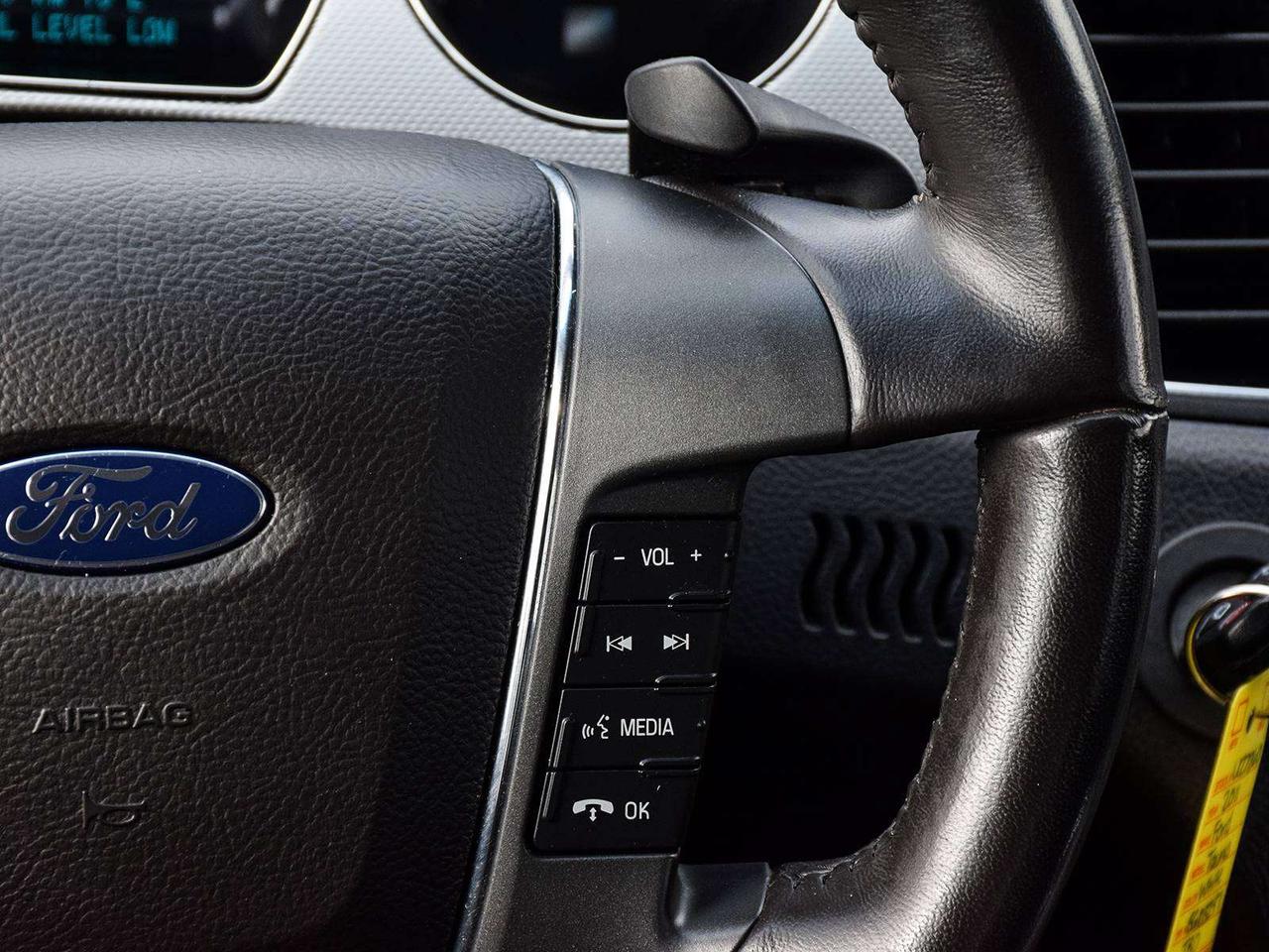 2011 Ford Taurus SEL ~Heated + Power Seats ~Bluetooth ~Alloys ~A/C Photo