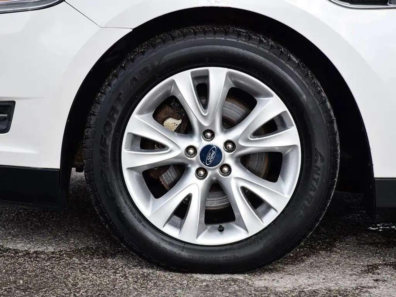 2011 Ford Taurus SEL ~Heated + Power Seats ~Bluetooth ~Alloys ~A/C Photo