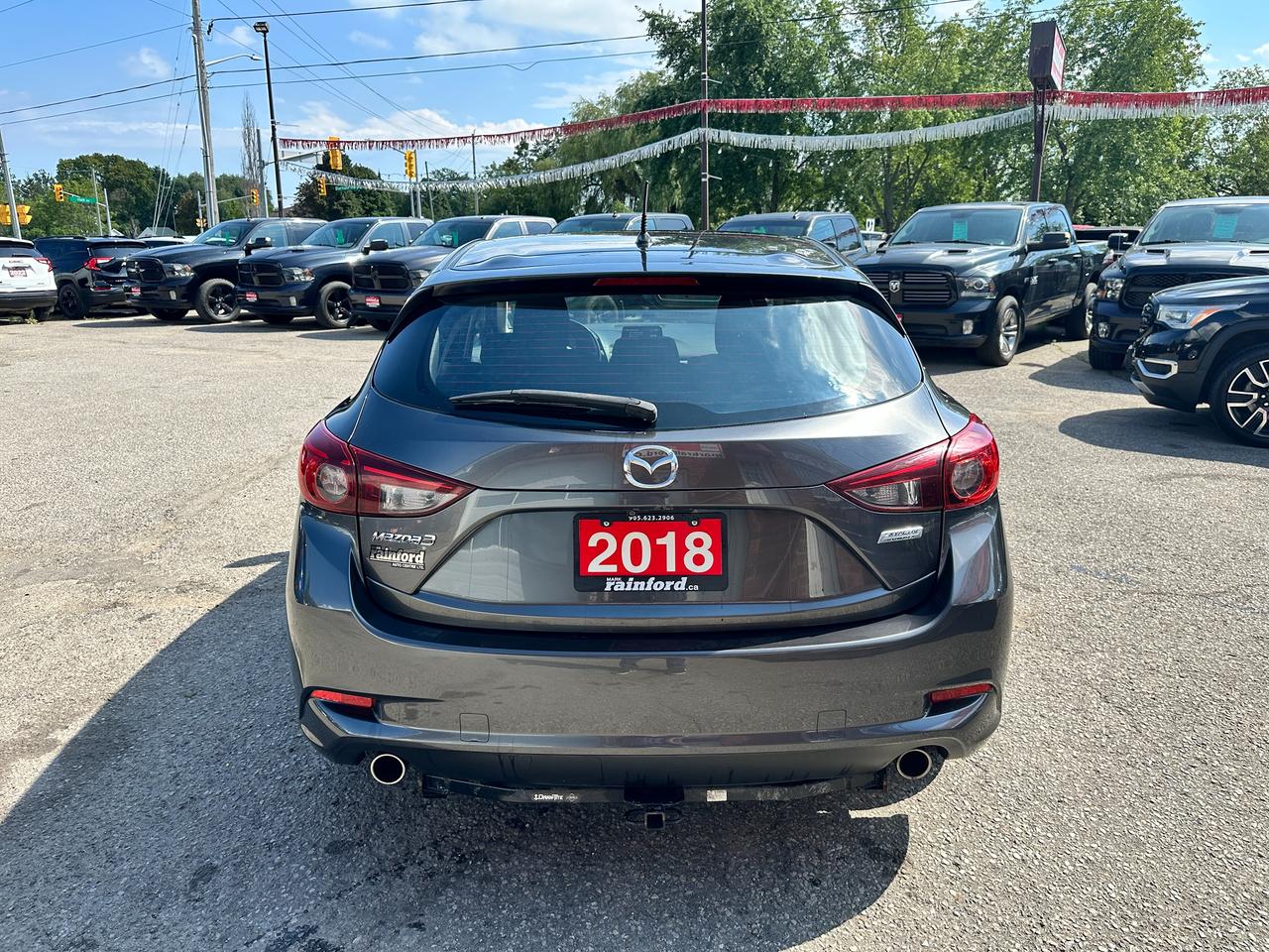 2018 Mazda MAZDA3 GS Hatch 2.0L HTD-Cloth FM Bluetooth BackupCam A/C Photo3