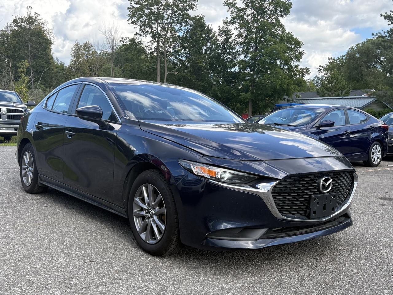 <div class=vehicle-description-wrapper><div class=vdp-description prose><p>2021 Mazda 3 2.0L 4 Cylinder engine. Comes with blind spot monitor, heated seats, back up camera, brand new winter tires and air conditioning. 128106 kms. Listed for $16995. Carfax available upon request. Call 613-878-7436 to inquire more information</p></div></div><div class=dsp-collapse vdp-collapse p-8 flex flex-col border-t>&nbsp;</div>