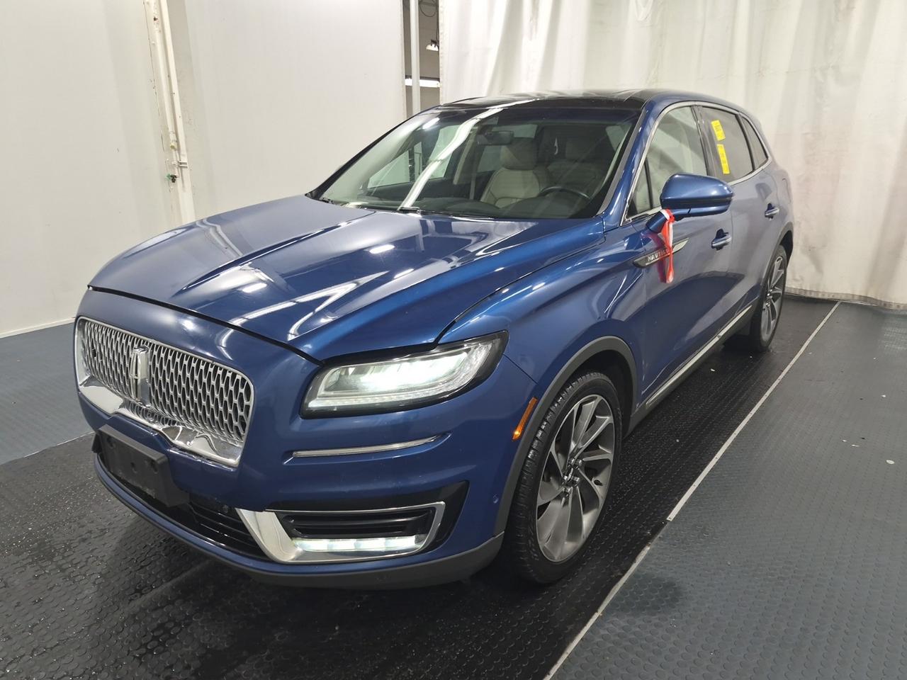 <p>UNIT IN TRANSIT.</p><p>Experience refined luxury and confident capability with this stunning 2020 Lincoln Nautilus Reserve AWD, now available at Fusion Auto Sales. Dressed in an eye-catching blue exterior and complemented by a sophisticated light grey leather interior, this SUV offers a driving experience that&rsquo;s as elegant as it is exhilarating. With 158,368 kilometers on the odometer, this Nautilus has been well-maintained and is ready to embark on your next adventure, providing the comfort and performance synonymous with the Lincoln brand.</p><p>This Nautilus Reserve AWD is designed to elevate your daily commute and weekend getaways. Its spacious interior and versatile SUV/Crossover body style make it perfect for families or anyone who values practicality without compromising on style. The potent 2.0L V4 Turbo engine, paired with an automatic transmission and All-Wheel Drive, ensures smooth power delivery and exceptional traction in all Canadian driving conditions, from sunny highways to snowy streets.</p><p>At Fusion Auto Sales, were proud to offer vehicles that blend sophisticated design with cutting-edge technology. This 2020 Lincoln Nautilus Reserve AWD is a prime example, offering a premium automotive experience thats built to impress. Come explore this exceptional vehicle and discover the Lincoln difference for yourself.</p><p>Here are 5 features that bring the sizzle to this 2020 Lincoln Nautilus Reserve AWD:</p><ul><li><strong>All-Wheel Drive (AWD) Capability:</strong> Conquer any Canadian road with confidence, enjoying enhanced grip and stability in rain, snow, and challenging conditions.</li><li><strong>Luxurious Light Grey Leather Interior:</strong> Sink into unparalleled comfort and sophisticated style with premium leather seating that creates an inviting cabin atmosphere.</li><li><strong>2.0L V4 Turbo Engine:</strong> Experience a dynamic blend of power and efficiency, delivering responsive acceleration for an engaging driving experience.</li><li><strong>Reserve Trim Excellence:</strong> Enjoy a higher level of refinement and premium appointments that set this Nautilus apart, showcasing Lincolns commitment to luxury.</li><li><strong>Spacious SUV/Crossover Versatility:</strong> Benefit from ample cargo space and a comfortable ride for passengers, making it the perfect companion for everyday errands and longer journeys alike.</li></ul><p><strong><em>Powered by AutoIntelligence&trade;</em></strong></p><p>Vehicle information has been generated using artificial intelligence and is provided for informational purposes only. While efforts are made to ensure accuracy, please confirm all details directly with the dealer.</p><p>The Fusion Philosophy<br><br>At Fusion Auto Sales, we put more effort into buying our vehicles than we do trying to sell them. By constantly monitoring what other car lots are doing, we strive to be the lowest priced dealer in our market. We won&rsquo;t purchase a vehicle to &ldquo;fill a hole&rdquo;. We know that the vehicles on our lot are great value for the money and smart shoppers realize that also. Adhering to this philosophy makes it easy for our customers. If they find a vehicle on our lot that fulfills their needs and wants, they know that they&rsquo;re getting great value. <br><br>If we don&rsquo;t have what you&rsquo;re looking for, we can find it! Over 150 customers have saved thousands of dollars buy joining our&rdquo; locate club&rdquo;. People that know what they want and what they want to pay (within reason of course), get the vehicle of their dreams and enjoy huge savings. Contact us for details.<br><br><br><br>Fusion Auto Sales is in Tilbury, Ont. located between Windsor and London right off the 401. We are among 7 dealerships within a &frac12; kilometer distance which is great for out of town shoppers. We began satisfying customers in 2009 and have been doing so ever since. In 2012 Fusion was recognized as 1 of the 50 fastest growing companies in Canada. And then, in 2018, we were named one of the top 5 independent automobile dealerships in the country. <br><br>We specialize in late model vehicles at below than average pricing, everything is fully certified and every unit is Car Proof verified and is fully disclosed with every unit. We offer every type of financing from perfect credit at great rates to credit challenges with competitive rates. We also specialize in locating vehicles for customers, we cant have everything on the lot so if you do not see it and are having a hard time finding what you are looking for, let us know and we can find it for you. Fusion Auto Sales spans its customer base from Windsor all the way to Timmins, On and every where in between. Our philosophy is You are going to like the way we deal and everyone does, straight honest answers with no monkey business and no back and forth between sales and managers.</p>