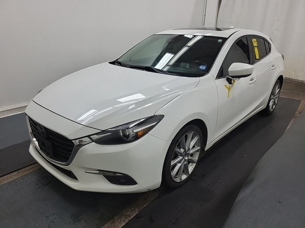 ** ** SPECIAL LIMITED TIME OFFER ** ** PURCHASE ANY VEHICLE THIS WEEK AND RECEIVE 4 BRAND-NEW ALL-SEASON TIRES AT NO ADDITIONAL COST!!! DON   T MISS THIS EXCLUSIVE CHANCE TO UPGRADE YOUR RIDE AND STAY PREPARED FOR ANY WEATHER!!! <br><br>EXCITING NEWS FROM FIRST CHOICE MOTORS! Our brand-new online showroom is now open to the public, bringing the ultimate car shopping experience right to your fingertips! Enjoy a 100% online car shopping experience, with over 500 certified vehicles in stock, comprehensive protection plans, and thousands of new auto parts & accessories available! Plus, for a limited time, were offering FREE deliveries across Ontario on all vehicle purchases! Dont miss out   visit Shop.fcmotors.ca to find and upgrade your perfect vehicle today!<br><br>Welcome to First Choice Motors, the largest car dealership in Toronto of pre-owned cars, SUVs, and vans priced between $5000-$15,000. With an impressive inventory of over 300 vehicles in stock, we are dedicated to providing our customers with a vast selection of affordable and reliable options. <br><br>Were thrilled to offer a used 2018 Mazda MAZDA3 GT Skyactiv, white color with 235,000km (STK#10245) This vehicle was $13990 NOW ON SALE FOR $12990. It is equipped with the following features:<br>- Automatic Transmission<br>- Hatchback<br>- Leather Seats<br>- Sunroof<br>- Heated seats<br>- Navigation<br>- Bluetooth<br>- Heads up display<br>- Reverse camera<br>- Alloy wheels<br>- Power windows<br>- Power locks<br>- Power mirrors<br>- Air Conditioning<br><br>At First Choice Motors, we believe in providing quality vehicles that our customers can depend on. All our vehicles come with a 36-day guarantee on all safety related items. We also offer additional warranty options up to 5 years for our customers who want extra peace of mind.<br><br>Furthermore, all our vehicles are sold fully certified with brand new brakes rotors and pads, a fresh oil change, and brand new set of all-season tires installed & balanced. You can be confident that this car is in excellent condition and ready to hit the road.<br><br>At First Choice Motors, we believe that everyone deserves a chance to own a reliable and affordable vehicle. Thats why we offer financing options with low interest rates starting at 7.9% O.A.C. Were proud to approve all customers, including those with bad credit, no credit, students, and even 9 socials. Our finance team is dedicated to finding the best financing option for you and making the car buying process as smooth and stress-free as possible.<br><br>Our dealership is open 7 days a week to provide you with the best customer service possible. We carry the largest selection of used vehicles for sale under $9990 in all of Ontario. We stock over 300 cars, mostly Hyundai, Chevrolet, Mazda, Honda, Volkswagen, Toyota, Ford, Dodge, Kia, Mitsubishi, Acura, Lexus, and more. With our ongoing sale, you can find your dream car at a price you can afford. Come visit us today and experience why we are the best choice for your next used car purchase!<br><br>All prices include $22.00 OMVIC Fee.  Excludes, license plates, ownership registration and ONTARIO HST (13%)<br>*No Credit Card payments can be accepted for Vehicle Purchases*