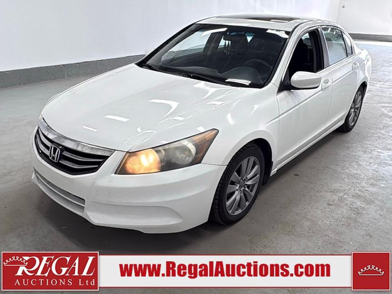 OFFERS WILL NOT BE ACCEPTED BY EMAIL OR PHONE - THIS VEHICLE WILL GO ON TIMED ONLINE AUCTION on Tuesday August 25.<br><br/>VEHICLE DESCRIPTION <br/>Stock #: 50096 <br/>Lot #: 889 <br/>Reserve Price: $6,000 <br/>CarProof Report: Available at www.RegalAuctions.com <br/><br/>IMPORTANT DECLARATION <br/>Claim History: Claim History. <br/>Hail Damage: Hail Damage. <br/>Odometer Declaration: Non-specific odometer declaration. <br/>Out of Province - QC: This vehicle has not previously been registered in Alberta. The purchaser must have the vehicle undergo and pass an Out of Province inspection before it can be registered in Alberta. <br/>Active Status: This vehicles title is listed as Active Status. <br/> Live Online Bidding: This vehicle will be available for bidding over the internet, visit www.RegalAuctions.com to register. <br/> <br/>The simple solution to selling your car or truck. Bring your clean vehicle in with your Drivers License and current Registration and well put it on the auction block at our next sale.<br/><br/>www.RegalAuctions.com