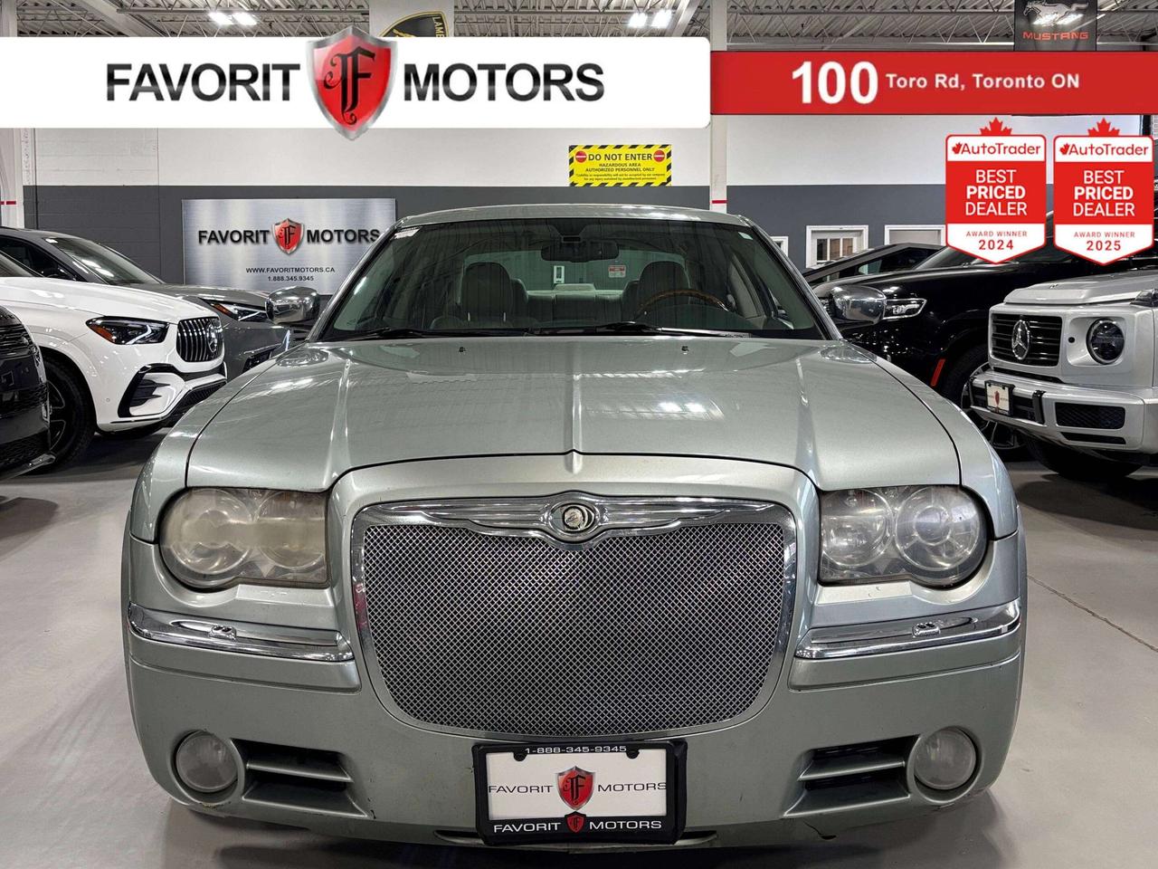 **MONTH-END SPECIAL!**FEATURING : RWD, SUNROOF, AUTO DIMMING MIRRORS, ANALOG CLOCK, HIGHLY EQUIPPED, VERY CLEAN! FINISHED IN SILVER ON MATCHING CREAM INTERIOR, STITCHED LEATHER SEATS, WOOD TRIMS, WOOD STEERING WHEEL, HEATED SEATS, NAVIGATION SYSTEM, PARKING SENSORS, CHROME ALLOYS, STEERING WHEEL CONTROLS, PREMIUM BOSTON PREMIUM SOUND SYSTEM, POWER OPTIONS, AND MUCH MORE!!! Applicable prices and special offers are subject to change with or without notice and shall be at the full discretion of Favorit Motors. <b>**This vehicle is being sold "AS-IS", unfit, not e-tested and is not represented as being in roadworthy condition, mechanically sound or maintained at any guaranteed level of quality. The vehicle may not be fit for use as a means of transportation and may require substantial repairs at the purchasers expense. It may not be possible to register the vehicle to be driven in its current condition.** **Certification & Financing are not available on AS-IS units, and no additional surcharge will apply to cash purchases of AS-IS units.**</b>