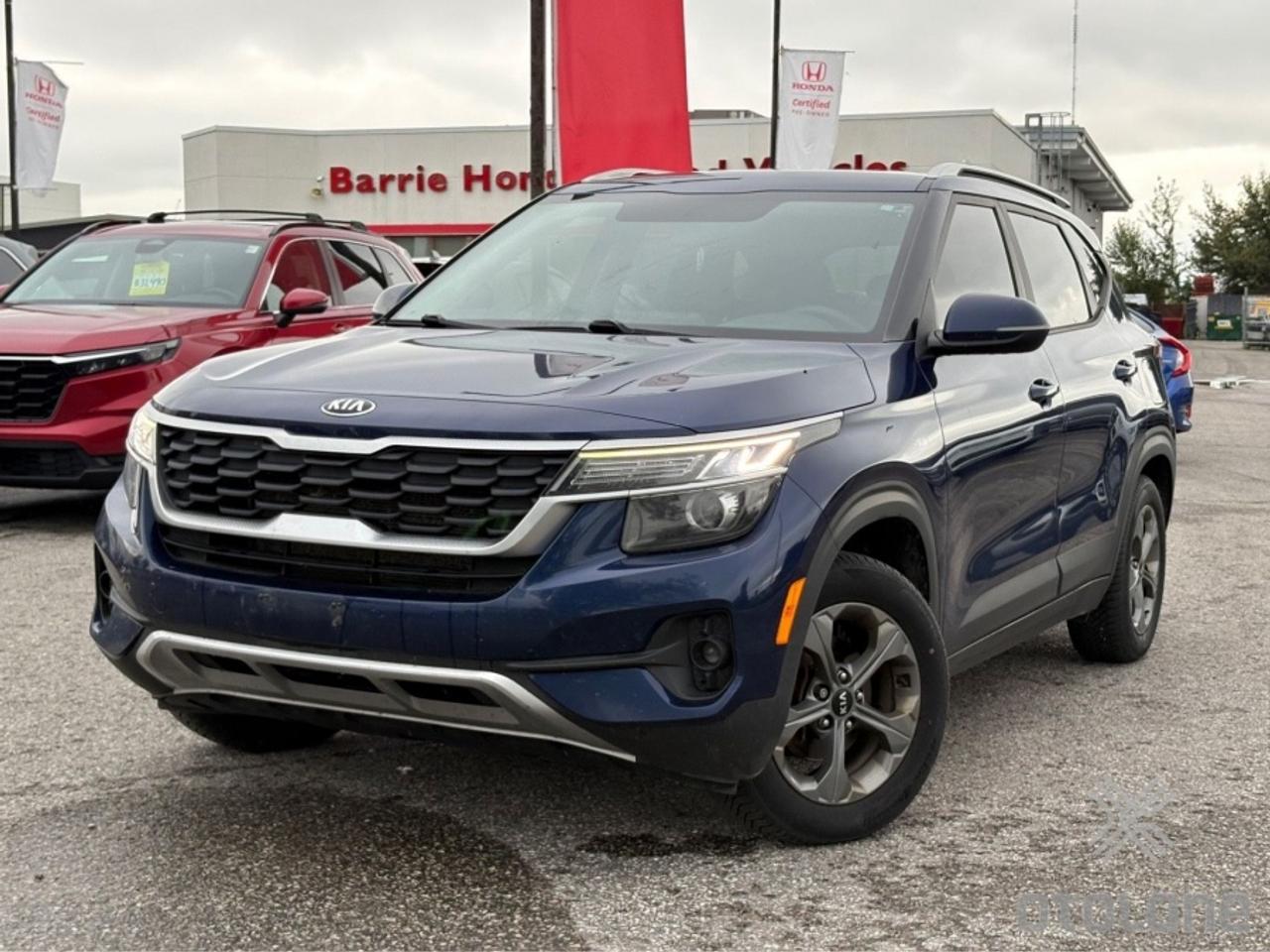 ** ** SPECIAL LIMITED TIME OFFER ** ** PURCHASE ANY VEHICLE THIS WEEK AND RECEIVE 4 BRAND-NEW ALL-SEASON TIRES AT NO ADDITIONAL COST!!! DON   T MISS THIS EXCLUSIVE CHANCE TO UPGRADE YOUR RIDE AND STAY PREPARED FOR ANY WEATHER!!! <br><br>EXCITING NEWS FROM FIRST CHOICE MOTORS! Our brand-new online showroom is now open to the public, bringing the ultimate car shopping experience right to your fingertips! Enjoy a 100% online car shopping experience, with over 500 certified vehicles in stock, comprehensive protection plans, and thousands of new auto parts & accessories available! Plus, for a limited time, were offering FREE deliveries across Ontario on all vehicle purchases! Dont miss out   visit Shop.fcmotors.ca to find and upgrade your perfect vehicle today!<br><br>Welcome to First Choice Motors, the largest car dealership in Toronto of pre-owned cars, SUVs, and vans priced between $5000-$15,000. With an impressive inventory of over 300 vehicles in stock, we are dedicated to providing our customers with a vast selection of affordable and reliable options. <br><br>Were thrilled to offer a used 2021 Kia Seltos LX, blue color with 215,000km (STK#10262) This vehicle was $13990 NOW ON SALE FOR $12990. It is equipped with the following features:<br>- Automatic Transmission<br>- Heated seats<br>- Heated steering wheel<br>- Bluetooth<br>- Apple CarPlay<br>- Reverse camera<br>- Alloy wheels<br>- Power windows<br>- Power locks<br>- Power mirrors<br>- Air Conditioning<br><br>At First Choice Motors, we believe in providing quality vehicles that our customers can depend on. All our vehicles come with a 36-day guarantee on all safety related items. We also offer additional warranty options up to 5 years for our customers who want extra peace of mind.<br><br>Furthermore, all our vehicles are sold fully certified with brand new brakes rotors and pads, a fresh oil change, and brand new set of all-season tires installed & balanced. You can be confident that this car is in excellent condition and ready to hit the road.<br><br>At First Choice Motors, we believe that everyone deserves a chance to own a reliable and affordable vehicle. Thats why we offer financing options with low interest rates starting at 7.9% O.A.C. Were proud to approve all customers, including those with bad credit, no credit, students, and even 9 socials. Our finance team is dedicated to finding the best financing option for you and making the car buying process as smooth and stress-free as possible.<br><br>Our dealership is open 7 days a week to provide you with the best customer service possible. We carry the largest selection of used vehicles for sale under $9990 in all of Ontario. We stock over 300 cars, mostly Hyundai, Chevrolet, Mazda, Honda, Volkswagen, Toyota, Ford, Dodge, Kia, Mitsubishi, Acura, Lexus, and more. With our ongoing sale, you can find your dream car at a price you can afford. Come visit us today and experience why we are the best choice for your next used car purchase!<br><br>All prices include $22.00 OMVIC Fee.  Excludes, license plates, ownership registration and ONTARIO HST (13%)<br>*No Credit Card payments can be accepted for Vehicle Purchases*