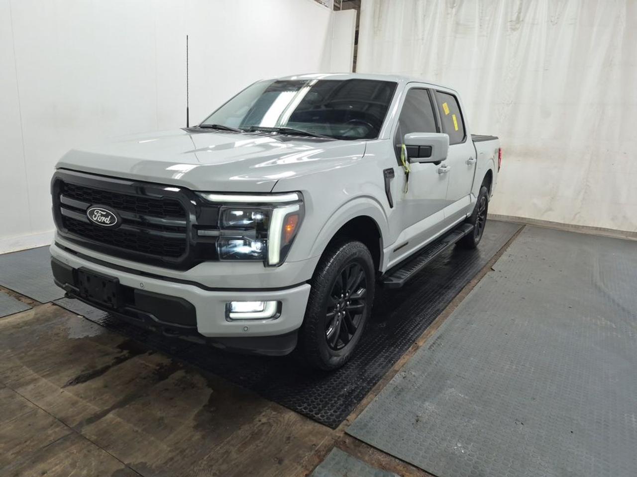 THE PRICE YOU SEE, PLUS GST. GUARANTEED!    APPLE CARPLAY/ANDROID AUTO COMPATABLE!      Ford Blue Advantage.  Rates from 5.09% to 5.89% available.  Comes with Blue Plan - additional 6 / 10,000KM Premium Care ESP, SiriusXM 3 Month Activation, Connected Services Trial 90 days, 10,000 Ford Rewards Points, Full tank of Fuel.3.5 LITER POWERBOOST HYBRID, HEV 10 SPEED AUTO, LARIAT TRIM(502a), BLACK LEATHER TRIMMED SEATS, HEATED/VENTED FRONT SEATS, HEATED REAR SEATS, HEATED STEERING WHEEL, TWIN PANEL MOONROOF, LARIAT BLACK APPEARANCE PKG, MOBILE OFFICE PKG, 360 DEGREE CAMERAS, 14 SPEAKER B&O UNLEASHED AUDIO SYSTEM, BLIS W/CROSS-TRAFFIC ALERT, SYNC 4.     The 2024 Ford F-150 Lariat with the 502A Package is a premium full-size pickup truck that combines luxury, advanced technology, and versatile powertrain options. Equipped with the 3.5-liter Hybrid Electric Vehicle (HEV) engine, it offers a blend of performance and fuel efficiency, making it suitable for both work and everyday driving. The Lariat trim elevates the trucks interior with high-quality materials, comfort features, and sophisticated styling, while the 502A Package adds further luxury amenities such as upgraded interior finishes, advanced driver-assistance systems, and enhanced infotainment options. The Black Appearance Package enhances its exterior with sleek black accents, including grille details, wheels, and exterior trim, giving the truck a bold, aggressive look. The Mobile Office Package provides practical features for remote work, including a workstation setup, connectivity options, and possibly a power outlet to support electronic devices, making it ideal for professionals on the go. Additionally, the 2kW Pro Power Onboard system offers a built-in power source capable of supporting tools, electronics, or small appliances, transforming the truck into a mobile power station.Do you want to know more about this vehicle, CALL, CLICK OR COME ON IN!*AMVIC Licensed Dealer; CarFax and Full Mechanical