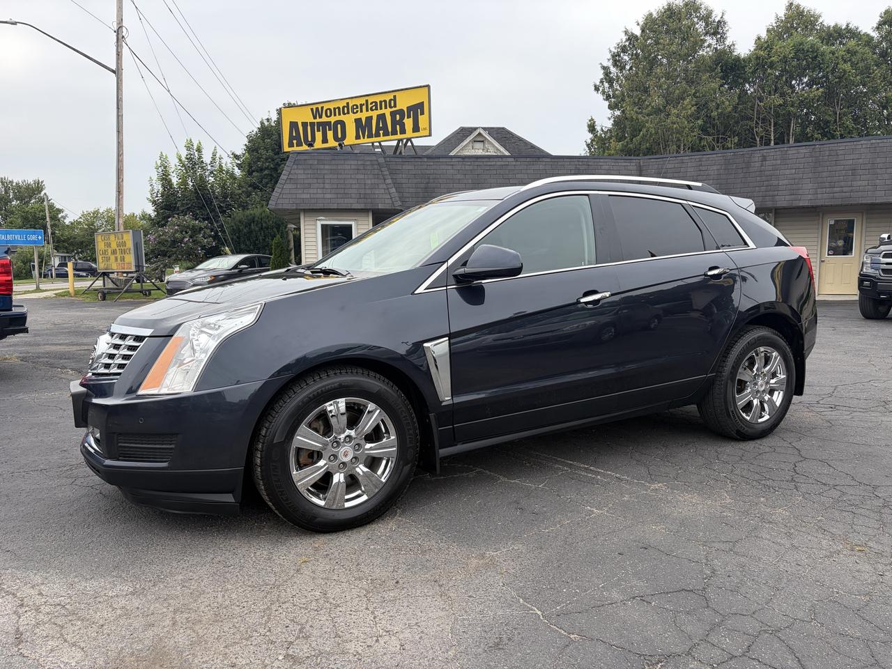 <p>Discover sophisticated driving with this stunning blue 2016 Cadillac SRX Luxury, now available at Wonderland Auto Mart. This meticulously maintained SUV offers a premium experience for those who appreciate both style and substance. Step inside the spacious black interior and be immediately enveloped in comfort and refined design, a testament to Cadillacs commitment to luxury. With its robust 6-cylinder engine and all-wheel-drive capability, this SRX is ready to handle Canadian roads with confidence and smooth performance, no matter the season. Boasting a clean Carfax report and a smooth automatic transmission, this Cadillac SRX is more than just a vehicle; its a statement of discerning taste and practical elegance. Currently showing 168,070 kilometers, its poised for many more adventures.</p><p>Here are five features that truly make this 2016 Cadillac SRX Luxury stand out:</p><ul><li><strong>Luxury-Leather-Loaded Interior:</strong> Immerse yourself in unparalleled comfort and opulence, featuring premium leather upholstery that elevates every drive.</li><li><strong>All-Wheel Drive Capability:</strong> Conquer any road condition with confidence, thanks to the intelligent all-wheel-drive system that ensures superior traction and stability.</li><li><strong>Clean Carfax Report:</strong> Drive with peace of mind, knowing this vehicle has a verified history of responsible ownership and no reported accidents.</li><li><strong>6-Cylinder Engine Power:</strong> Experience a smooth, responsive, and potent driving performance that effortlessly blends power with refined efficiency.</li><li><strong>SUV/Crossover Versatility:</strong> Enjoy the perfect fusion of passenger comfort and cargo space, making it ideal for family trips, weekend getaways, and everyday errands.</li></ul><p><strong><em>Powered by AutoIntelligence&trade;</em></strong></p><p>Vehicle information has been generated using artificial intelligence and is provided for informational purposes only. While efforts are made to ensure accuracy, please confirm all details directly with the dealer.</p>