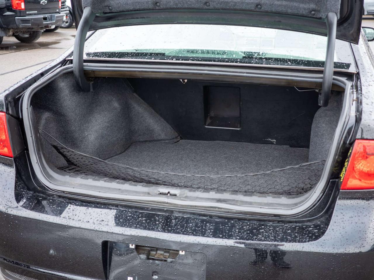2010 Buick Lucerne CXL - Woodgrain Interior Trim   Multi-Zone A/C Photo