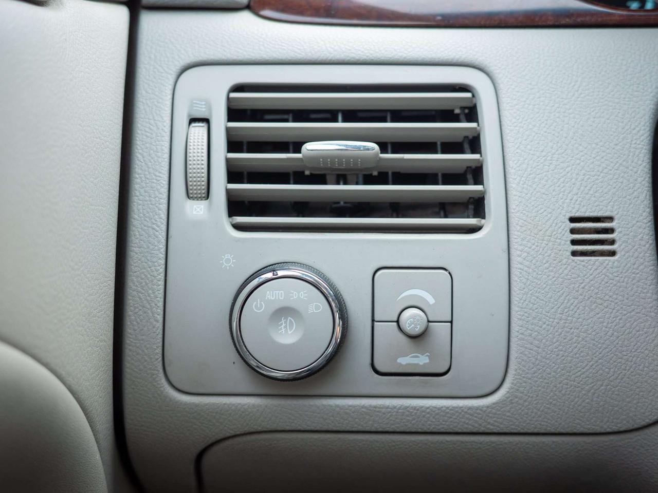 2010 Buick Lucerne CXL - Woodgrain Interior Trim   Multi-Zone A/C Photo