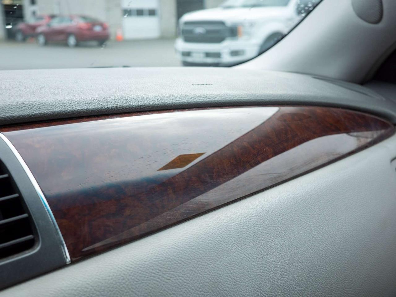 2010 Buick Lucerne CXL - Woodgrain Interior Trim   Multi-Zone A/C Photo