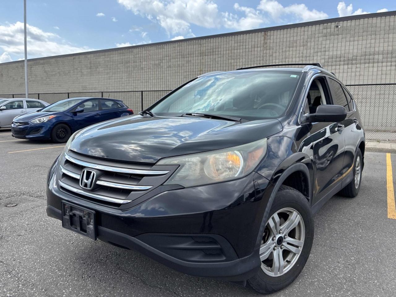** ** SPECIAL LIMITED TIME OFFER ** ** PURCHASE ANY VEHICLE THIS WEEK AND RECEIVE 4 BRAND-NEW ALL-SEASON TIRES AT NO ADDITIONAL COST!!! DON   T MISS THIS EXCLUSIVE CHANCE TO UPGRADE YOUR RIDE AND STAY PREPARED FOR ANY WEATHER!!! <br><br>EXCITING NEWS FROM FIRST CHOICE MOTORS! Our brand-new online showroom is now open to the public, bringing the ultimate car shopping experience right to your fingertips! Enjoy a 100% online car shopping experience, with over 500 certified vehicles in stock, comprehensive protection plans, and thousands of new auto parts & accessories available! Plus, for a limited time, were offering FREE deliveries across Ontario on all vehicle purchases! Dont miss out   visit Shop.fcmotors.ca to find and upgrade your perfect vehicle today!<br><br>Welcome to First Choice Motors, the largest car dealership in Toronto of pre-owned cars, SUVs, and vans priced between $5000-$15,000. With an impressive inventory of over 300 vehicles in stock, we are dedicated to providing our customers with a vast selection of affordable and reliable options. <br><br>Were thrilled to offer a used 2014 Honda CR-V LX, black color with 283,000km (STK#10270) This vehicle was $8990 NOW ON SALE FOR $7990. It is equipped with the following features:<br>- Automatic Transmission<br>- Heated seats<br>- All wheel drive<br>- Bluetooth<br>- Reverse camera<br>- Alloy wheels<br>- Power windows<br>- Power locks<br>- Power mirrors<br>- Air Conditioning<br><br>At First Choice Motors, we believe in providing quality vehicles that our customers can depend on. All our vehicles come with a 36-day guarantee on all safety related items. We also offer additional warranty options up to 5 years for our customers who want extra peace of mind.<br><br>Furthermore, all our vehicles are sold fully certified with brand new brakes rotors and pads, a fresh oil change, and brand new set of all-season tires installed & balanced. You can be confident that this car is in excellent condition and ready to hit the road.<br><br>At First Choice Motors, we believe that everyone deserves a chance to own a reliable and affordable vehicle. Thats why we offer financing options with low interest rates starting at 7.9% O.A.C. Were proud to approve all customers, including those with bad credit, no credit, students, and even 9 socials. Our finance team is dedicated to finding the best financing option for you and making the car buying process as smooth and stress-free as possible.<br><br>Our dealership is open 7 days a week to provide you with the best customer service possible. We carry the largest selection of used vehicles for sale under $9990 in all of Ontario. We stock over 300 cars, mostly Hyundai, Chevrolet, Mazda, Honda, Volkswagen, Toyota, Ford, Dodge, Kia, Mitsubishi, Acura, Lexus, and more. With our ongoing sale, you can find your dream car at a price you can afford. Come visit us today and experience why we are the best choice for your next used car purchase!<br><br>All prices include $22.00 OMVIC Fee.  Excludes, license plates, ownership registration and ONTARIO HST (13%)<br>*No Credit Card payments can be accepted for Vehicle Purchases*
