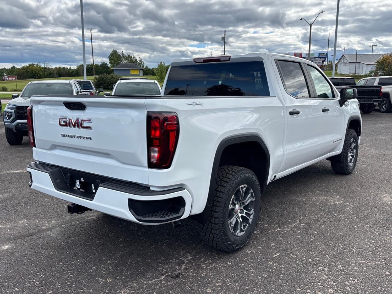 2026 GMC Sierra 1500 Pro New 6 Passenger Crew Cab V8 4X4 Truck with Factory Installed 2 Lift, and a 7 Diagonal Touch Screen Radio with Wireless Apple CarPlay/Android Auto Photo