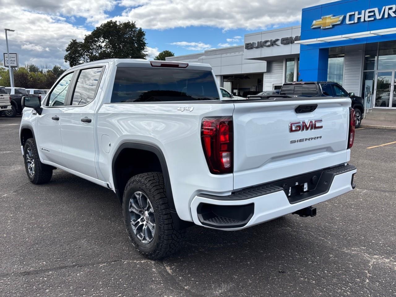 2026 GMC Sierra 1500 Pro New 6 Passenger Crew Cab V8 4X4 Truck with Factory Installed 2 Lift, and a 7 Diagonal Touch Screen Radio with Wireless Apple CarPlay/Android Auto Photo