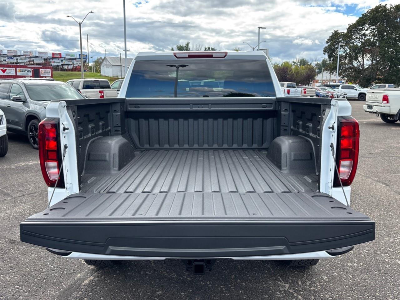 2026 GMC Sierra 1500 Pro New 6 Passenger Crew Cab V8 4X4 Truck with Factory Installed 2 Lift, and a 7 Diagonal Touch Screen Radio with Wireless Apple CarPlay/Android Auto Photo